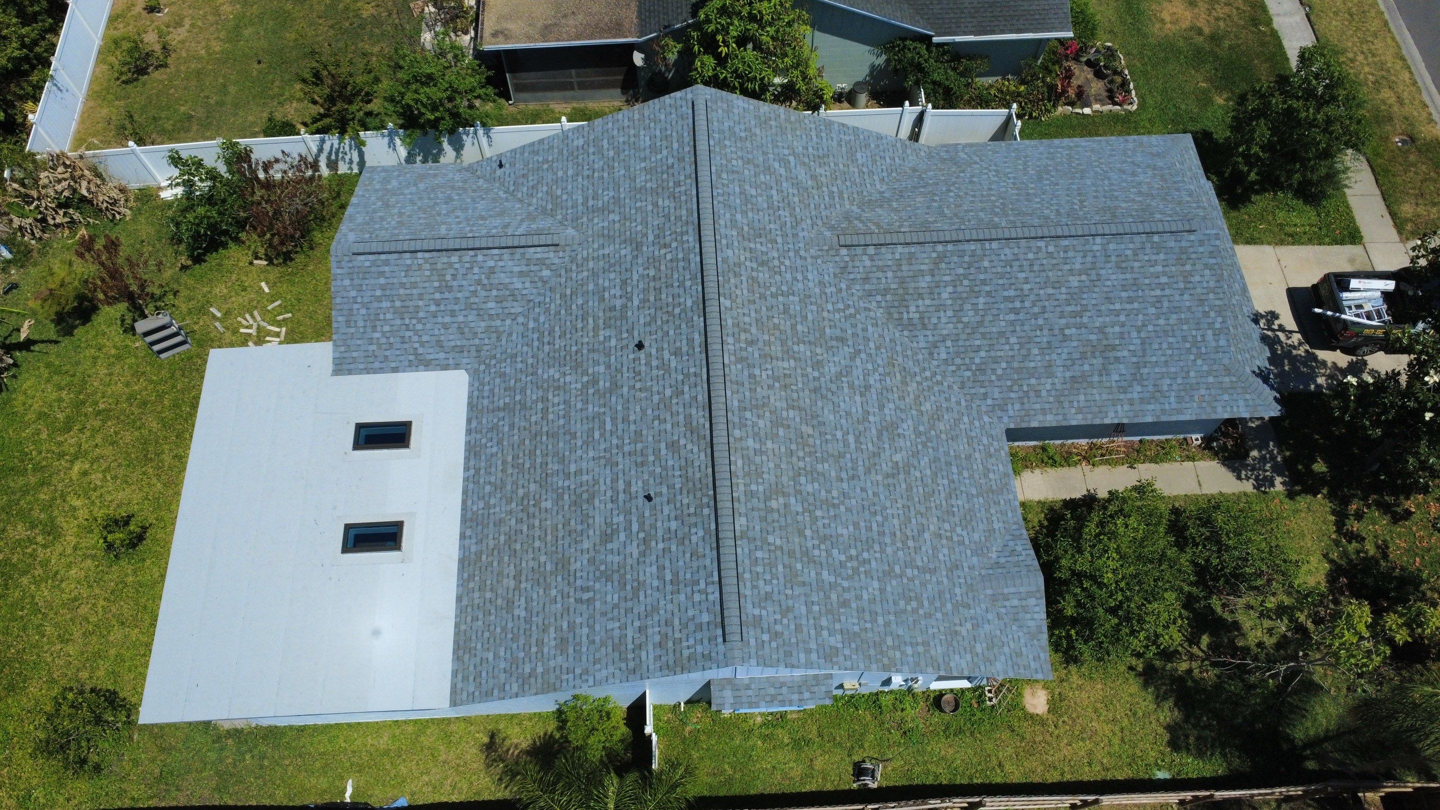 Owens Corning Shingle Roof Replacement and Skylight Upgrade in Tampa by Steadfast Roofing