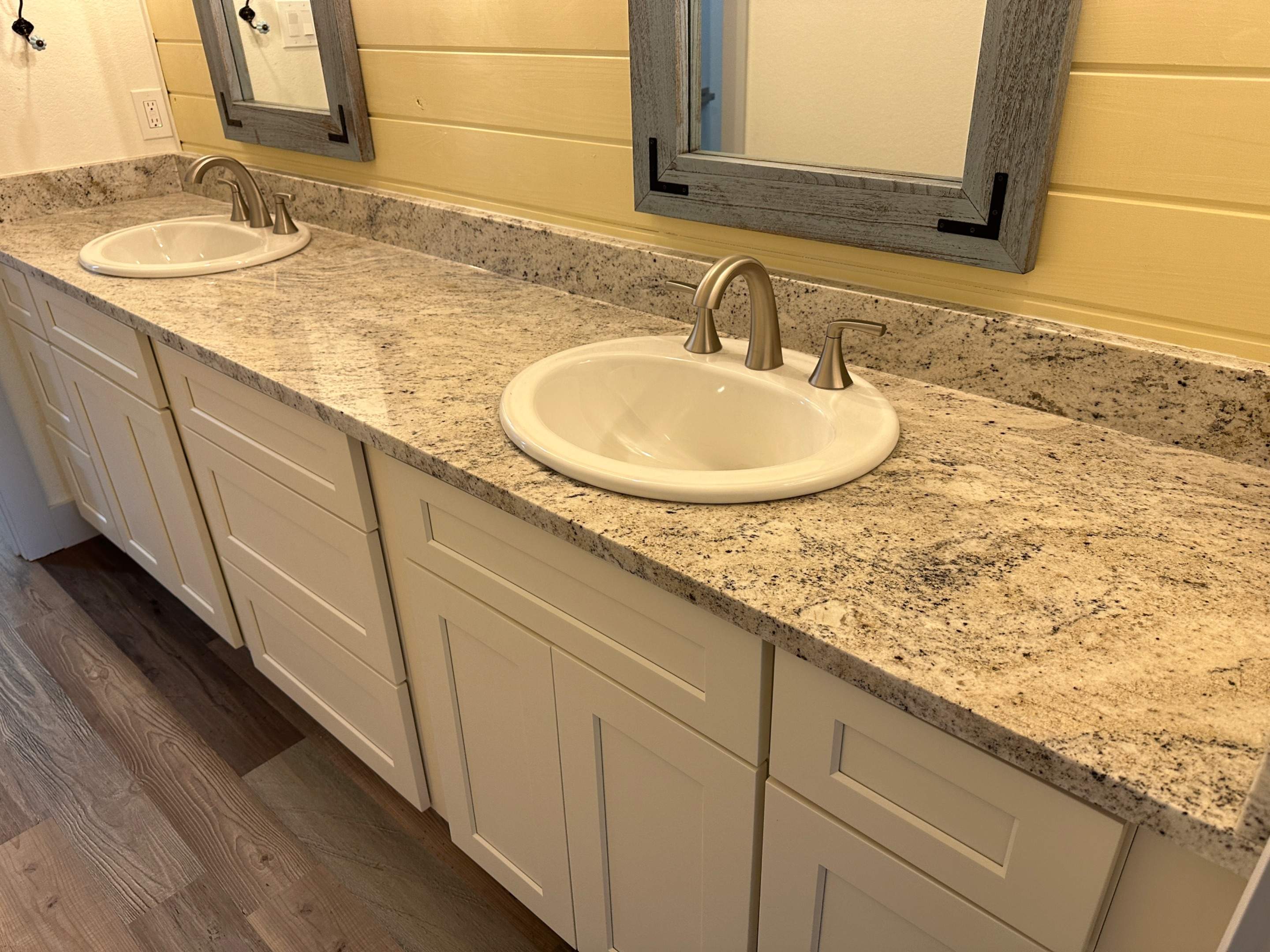 Antique shaker cabinets and granite kitchen and bathroom installation by Mena stone surfaces