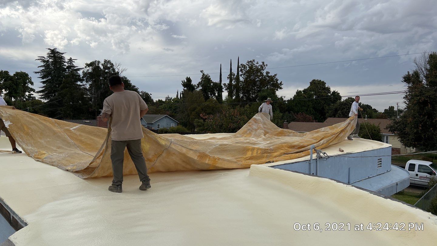 Residential Roofing Installation using Spray foam roofing insulation and General Coatings acrylic coatings by Straight Edge Roofing Inc