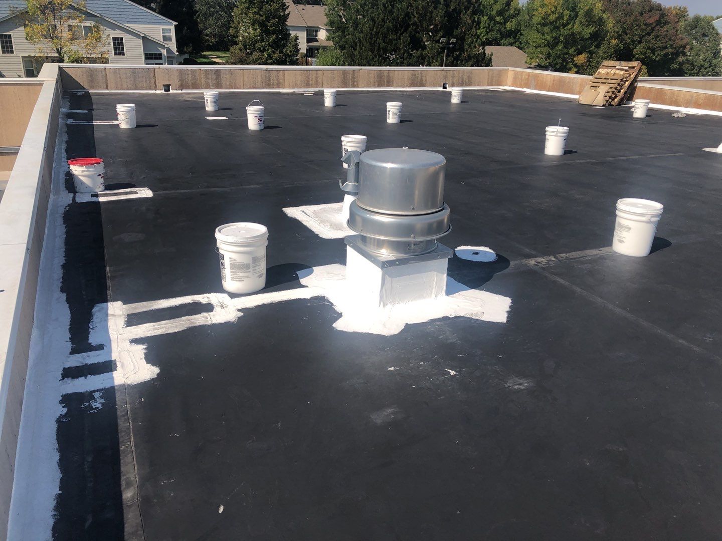 Commercial Roofing Installation using American Standard Coating - S  by A to Z Roofing