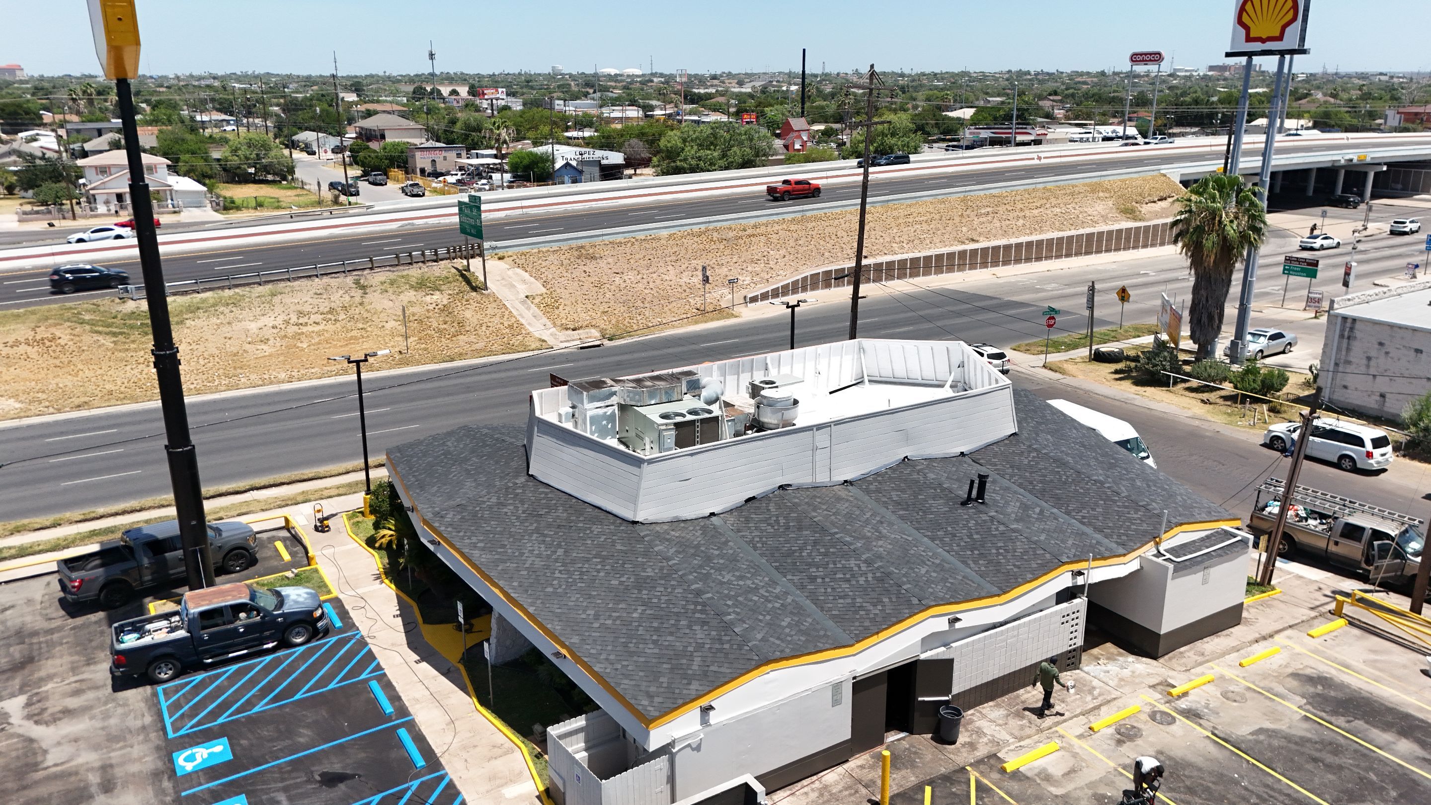 Commercial Asphalt Shingle and Flat Roof Installation in Laredo by JM Flores Roofing & Construction, Inc