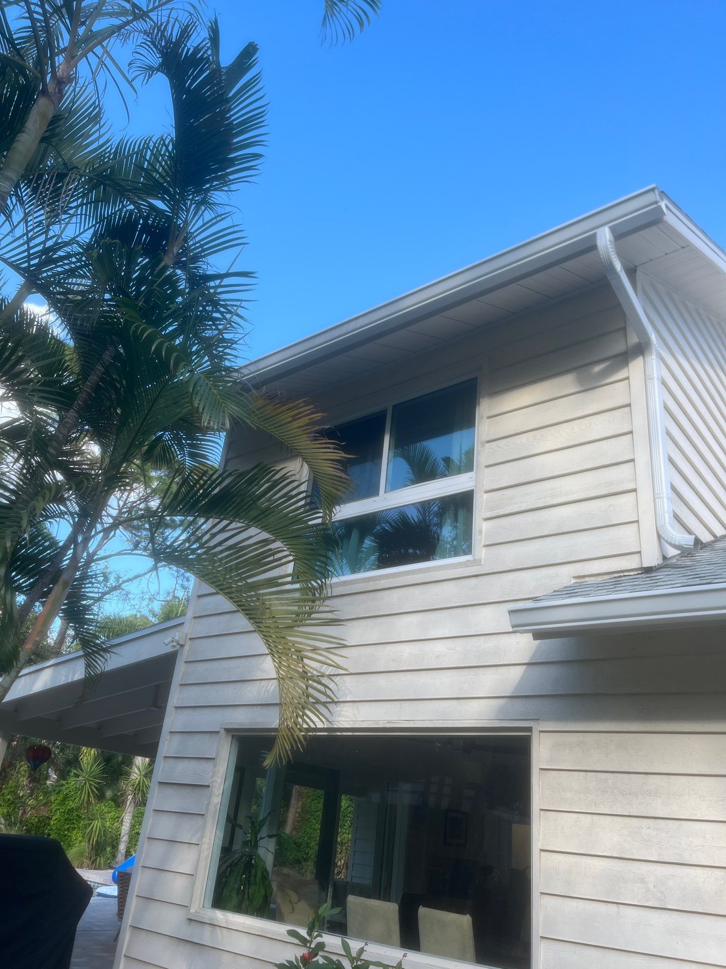 White 6-Inch Seamless Gutters Installation in Sarasota FL by Gutter Professors