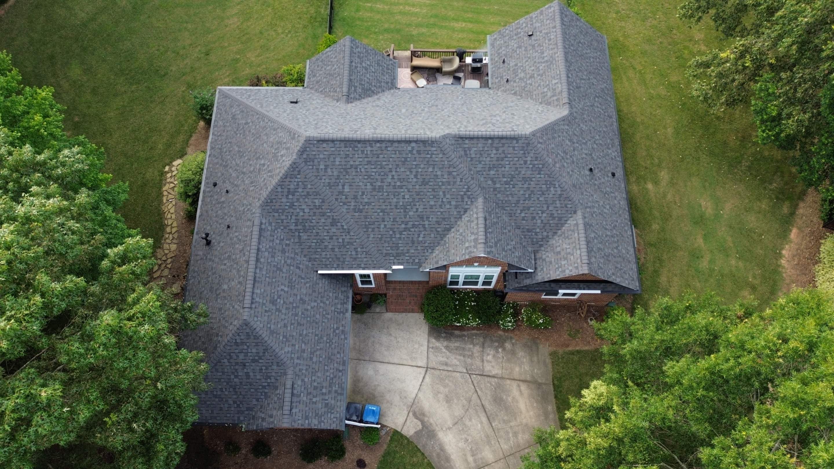 Residential Roof Replacement and Seamless Gutter Installation in Wesley Chapel, NC by Merritt Roofing LLC