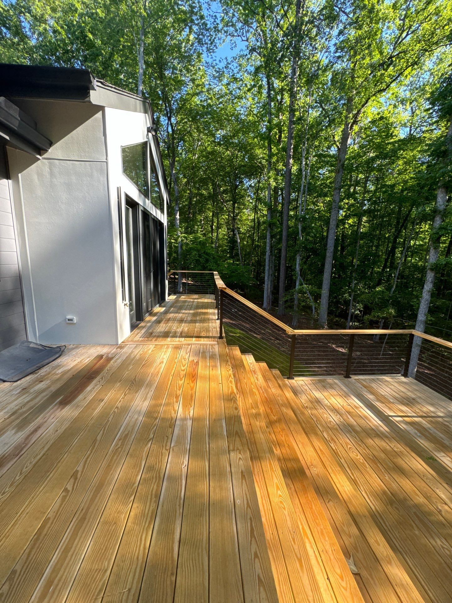 Porch and Deck staining  by GonzalezPainters & Contractors Inc 