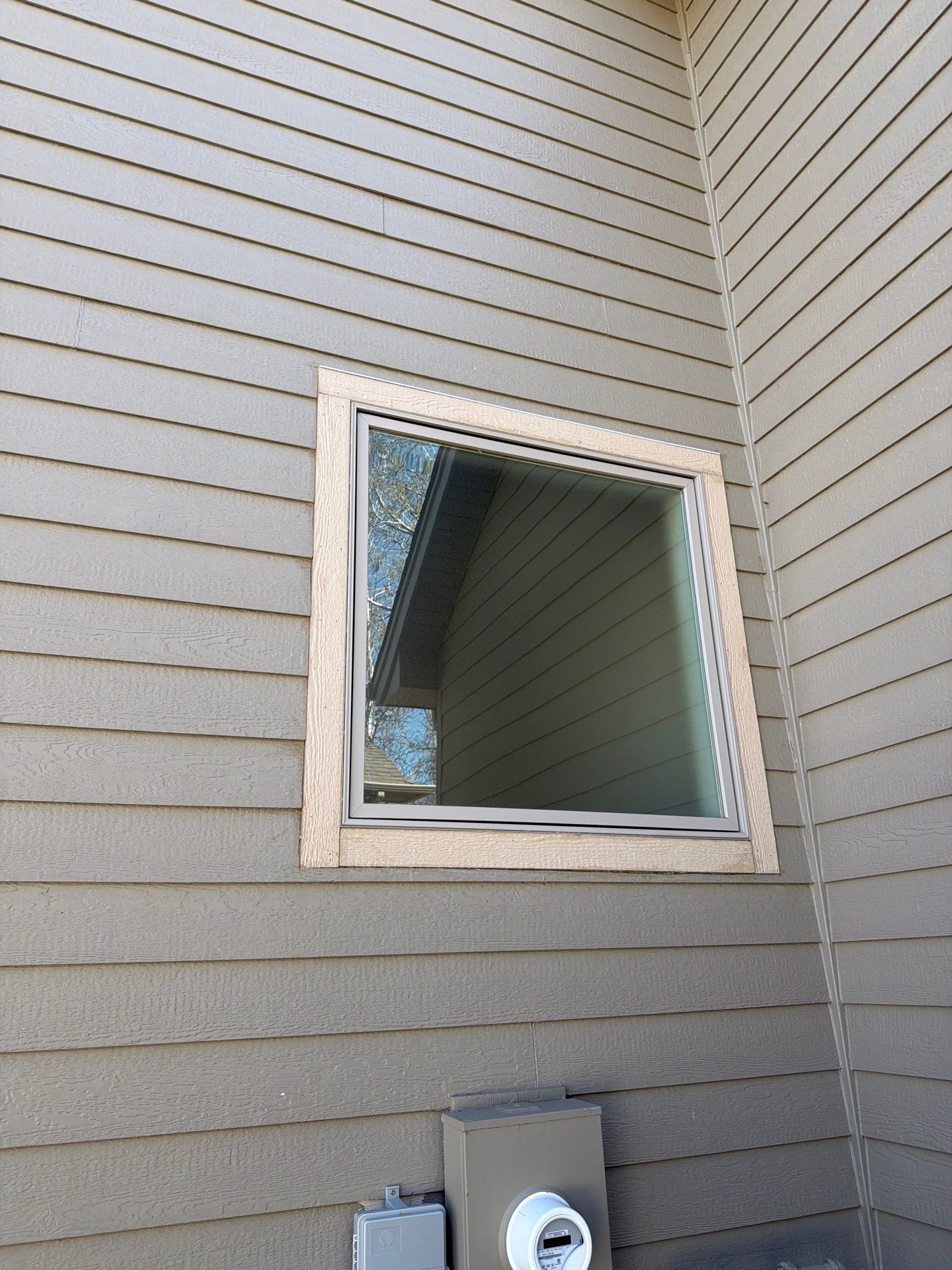 Residential Exterior Painting and Siding Refresh in Sioux Falls by Select Painting, Coatings & Garage Cabinets