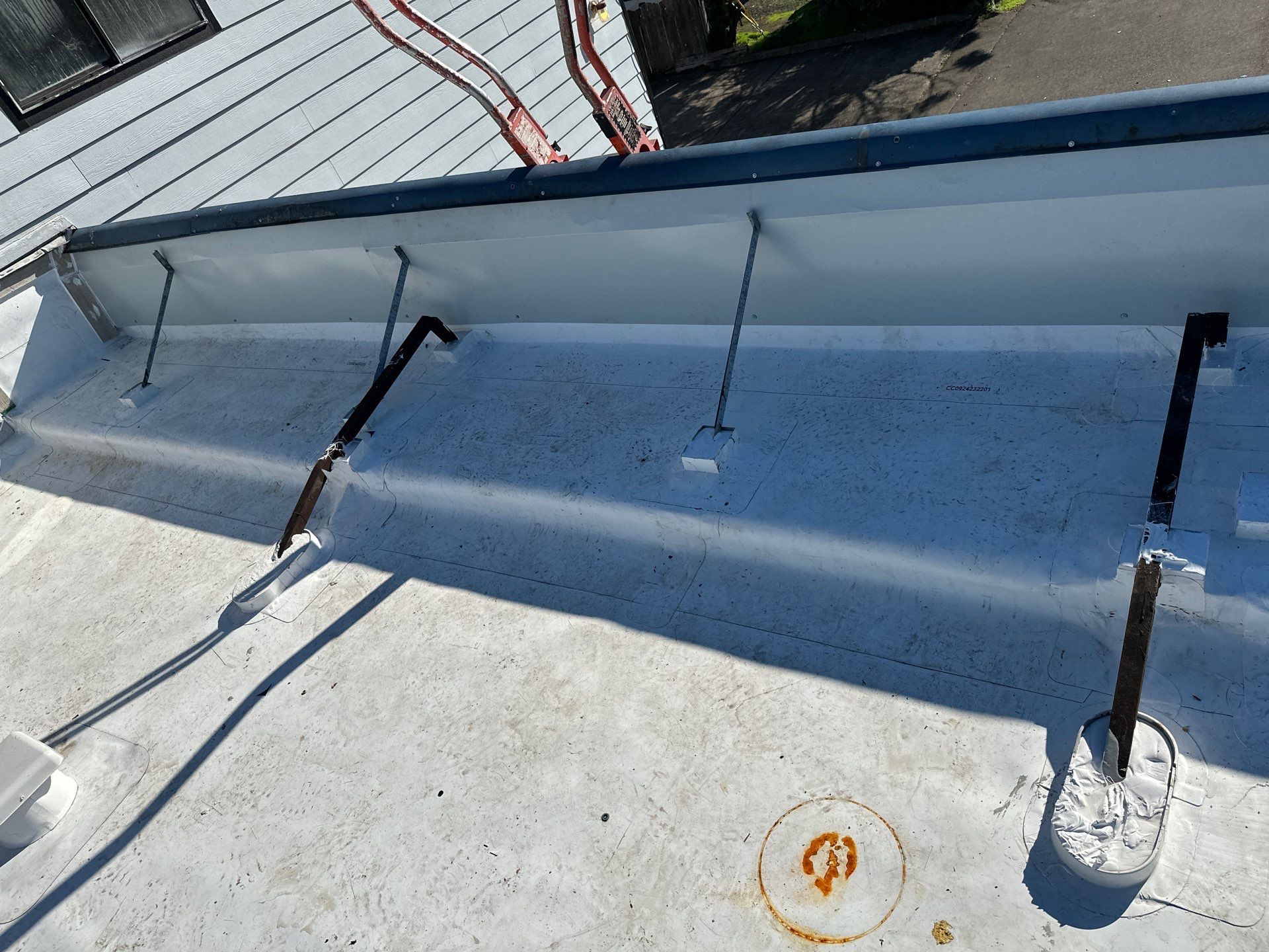 Commercial Roofing Installation using GAF 60Mil TPO  by Orezona Building & Roofing Company, Inc.