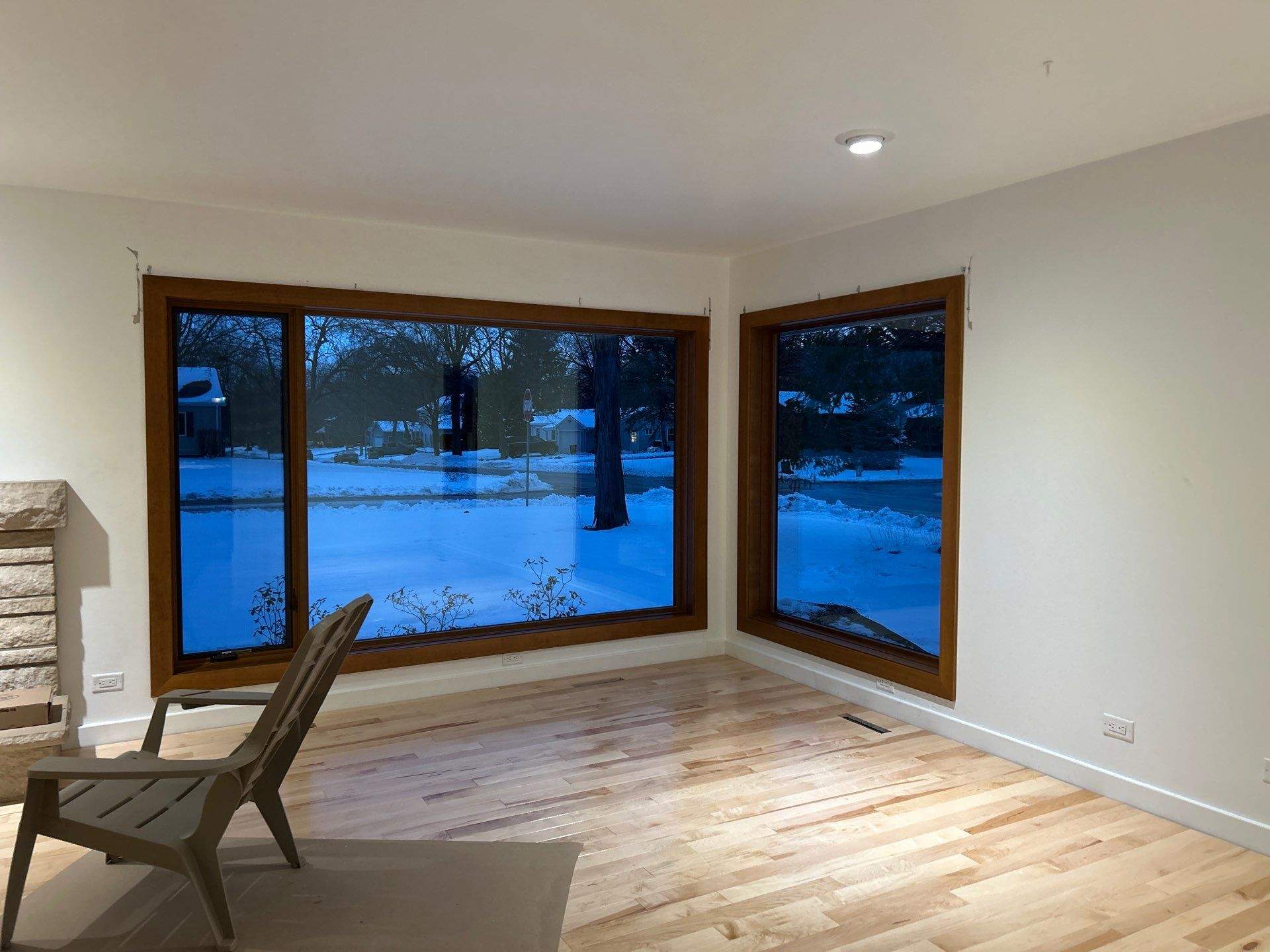 Black-Frame Pella Lifestyle Upgrade on a Partial Brick Home by United Windows and Siding LLC