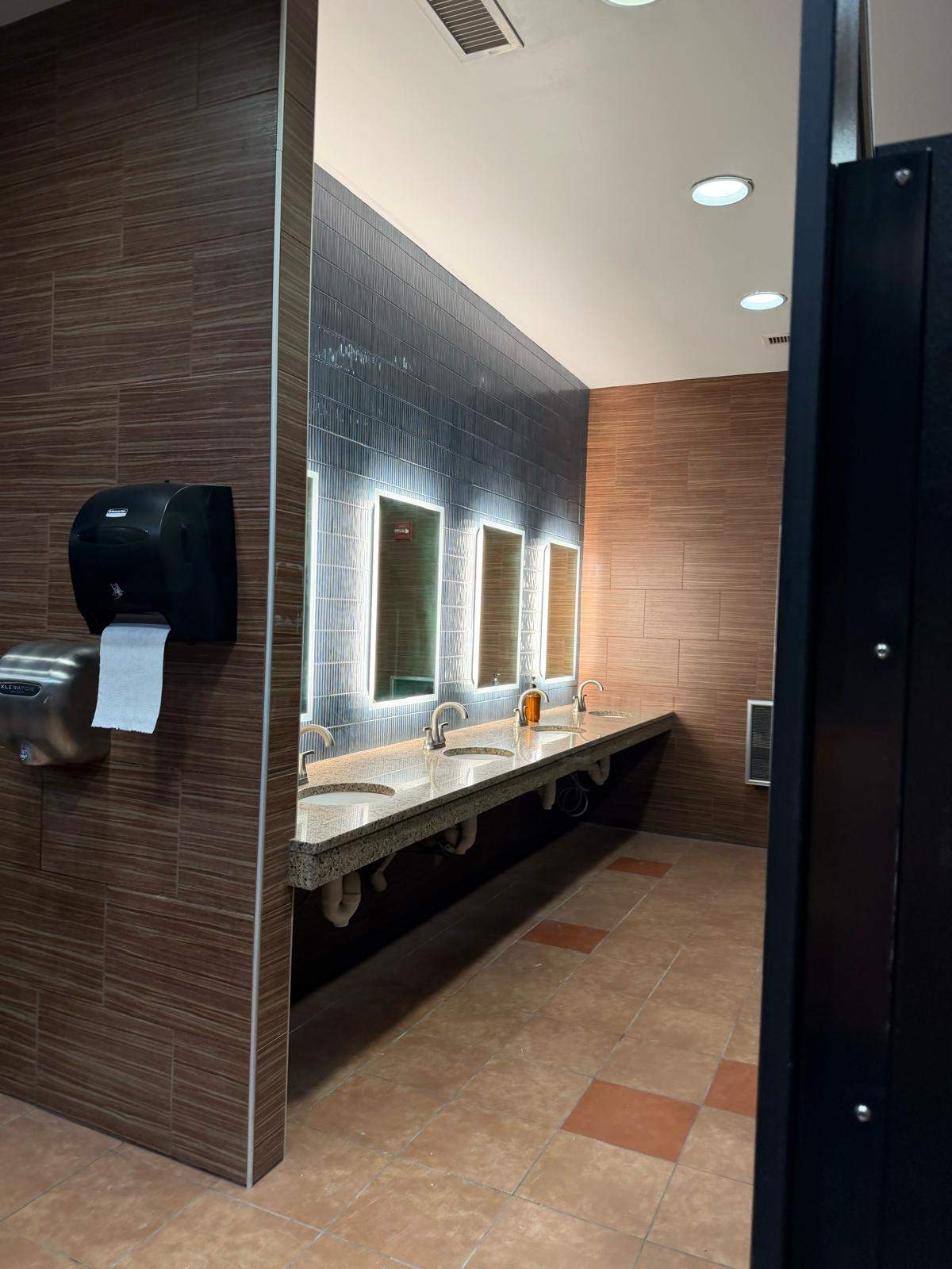 Sterling One Life - Men’s and Women’s Locker Room mirrors and backsplash by Nova HomeWorks