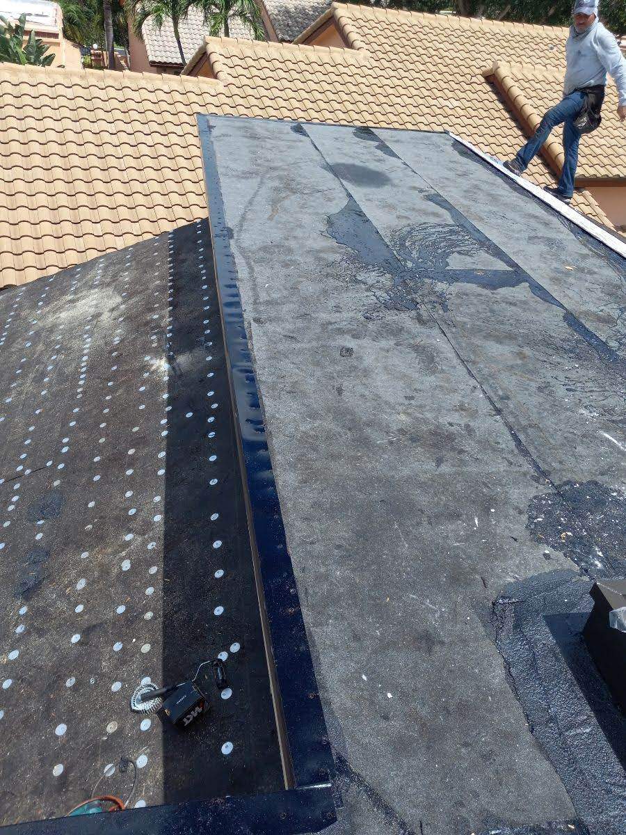Complete Chimney Rebuild + Tile & Flat Re-Roof  by Morton Roofing, Inc.