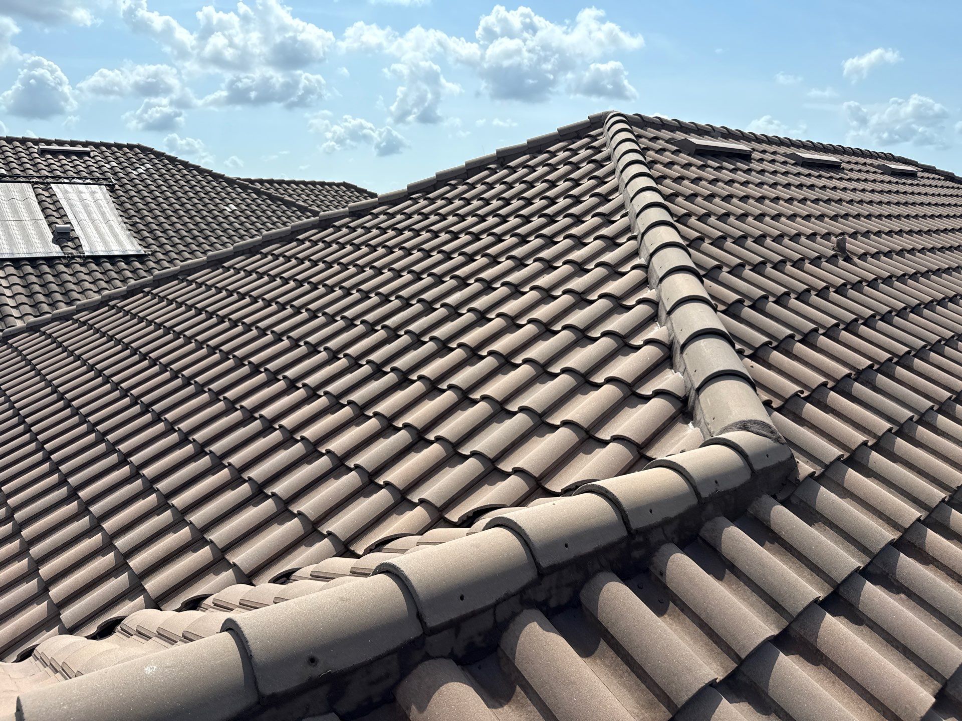 Soft Wash Roof Cleaning – Concrete Tile Roof | Artisan Lakes Esplanade, Palmetto, FL by Sunshine AquaWash
