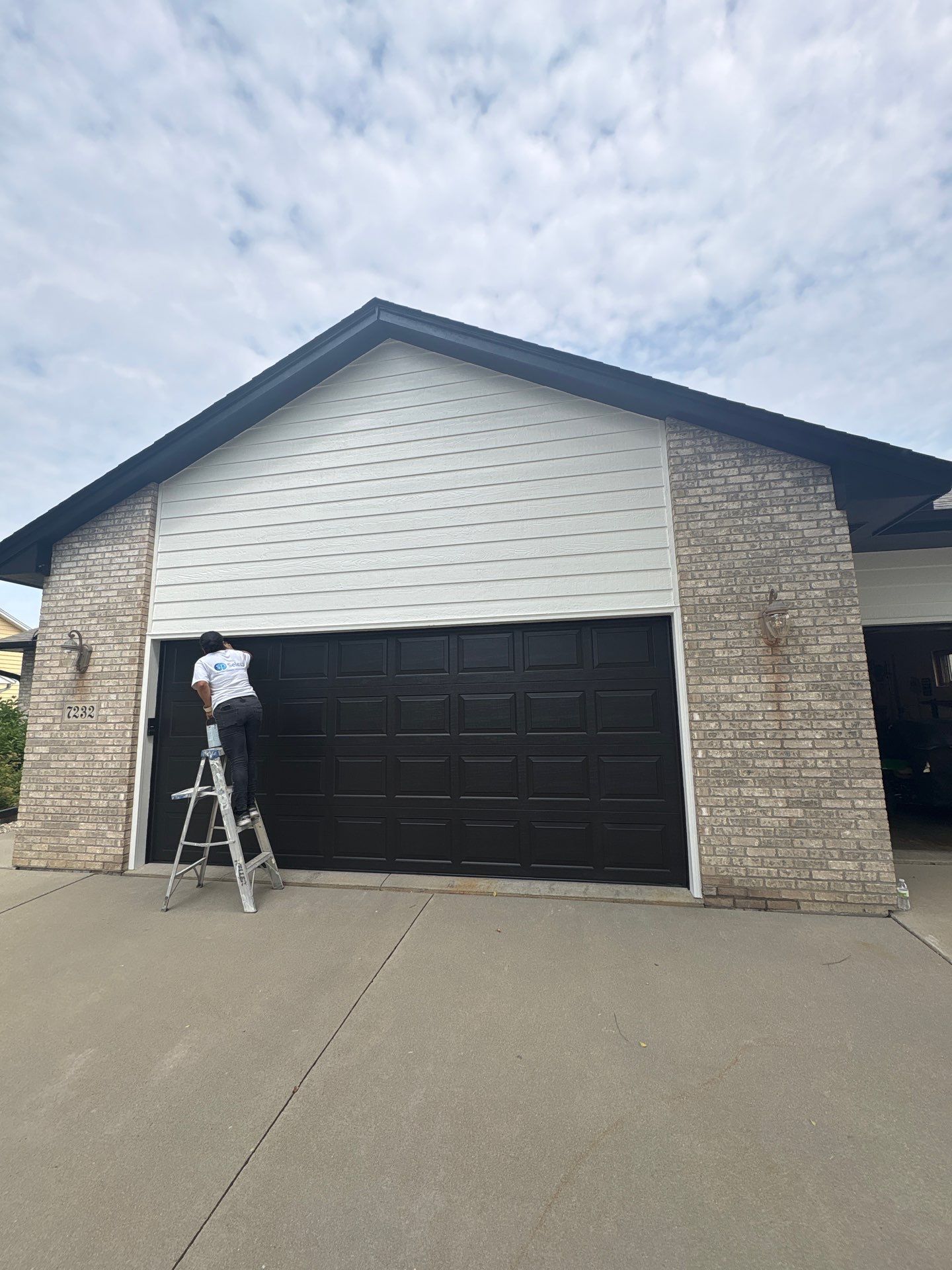 Residential Exterior Painting and Siding Refresh in Sioux Falls by Select Painting, Coatings & Garage Cabinets