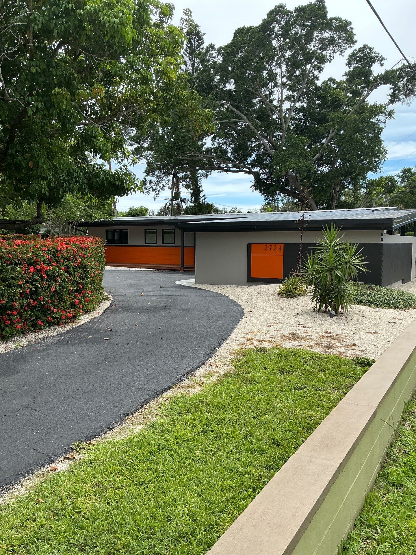 Black Seamless Gutters in Sarasota FL by Gutter Professors