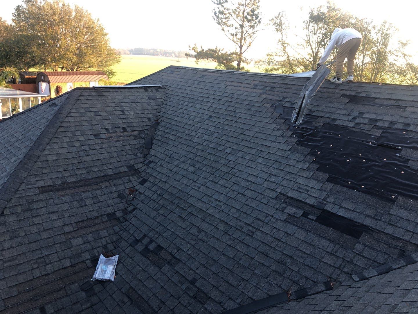 Residential Roofing Installation using Roof Replacement by American Roofing & Construction LLC