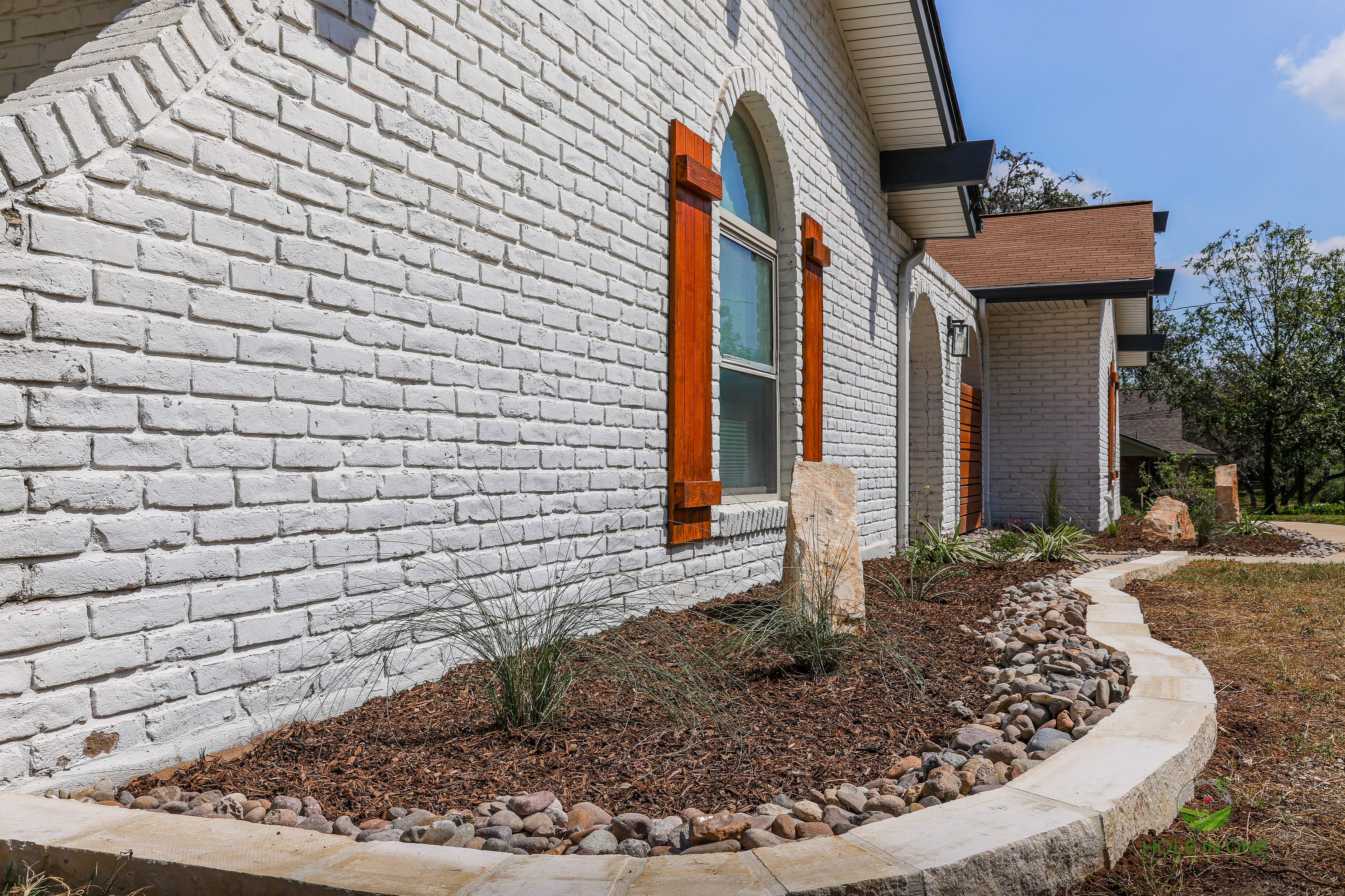 Front Paver Patio, Laredo Rock & Xeriscape Beds | Hollywood Park, San Antonio TX by Hole In One Lawns, LLC