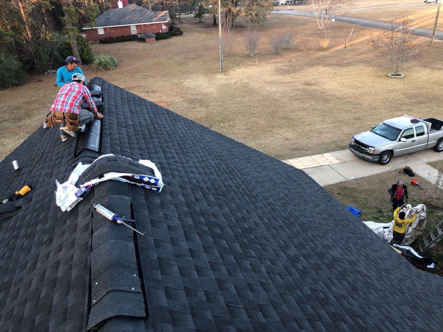 Residential Roofing Installation using Roof Replacement by American Roofing & Construction LLC