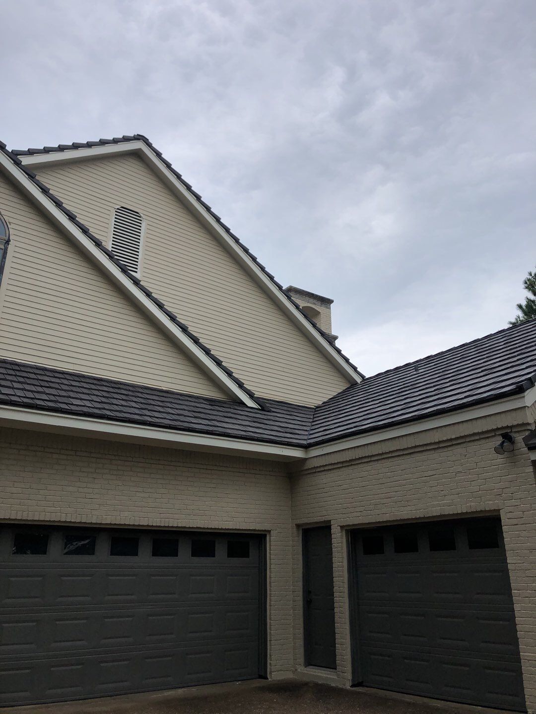 Designer Residential Roof with Zip System by Springtree Restoration