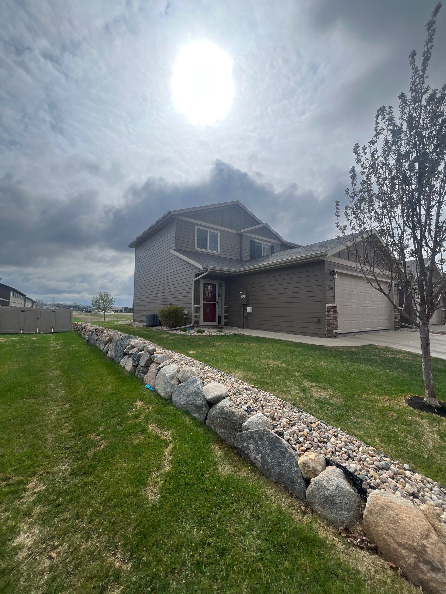 Exterior Painting for Multi-Unit Townhomes in Sioux Falls by Select Painting, Coatings & Garage Cabinets