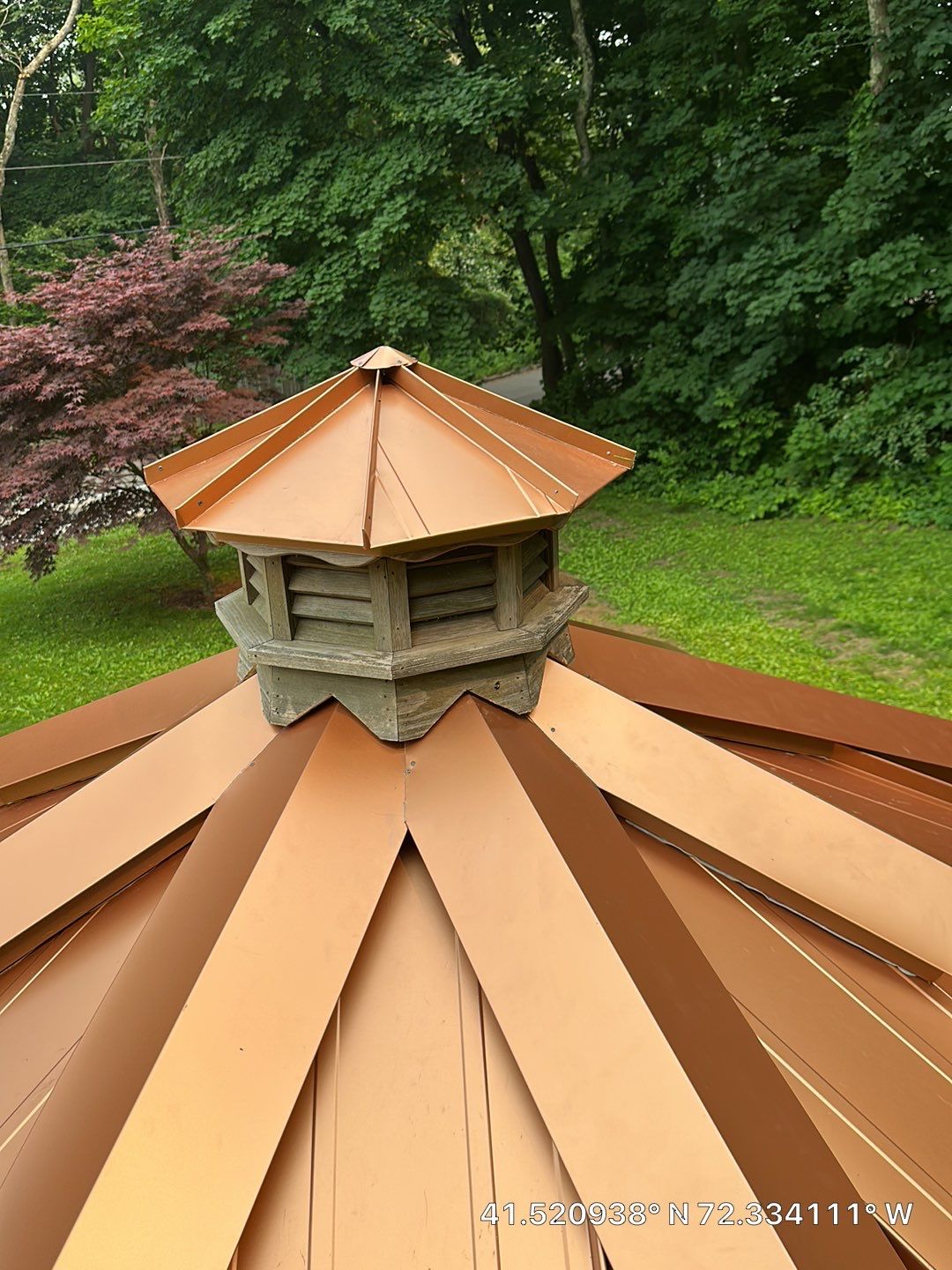 Residential Roofing Installation using Copper Penny Metal Roof by A Plus Exterior
