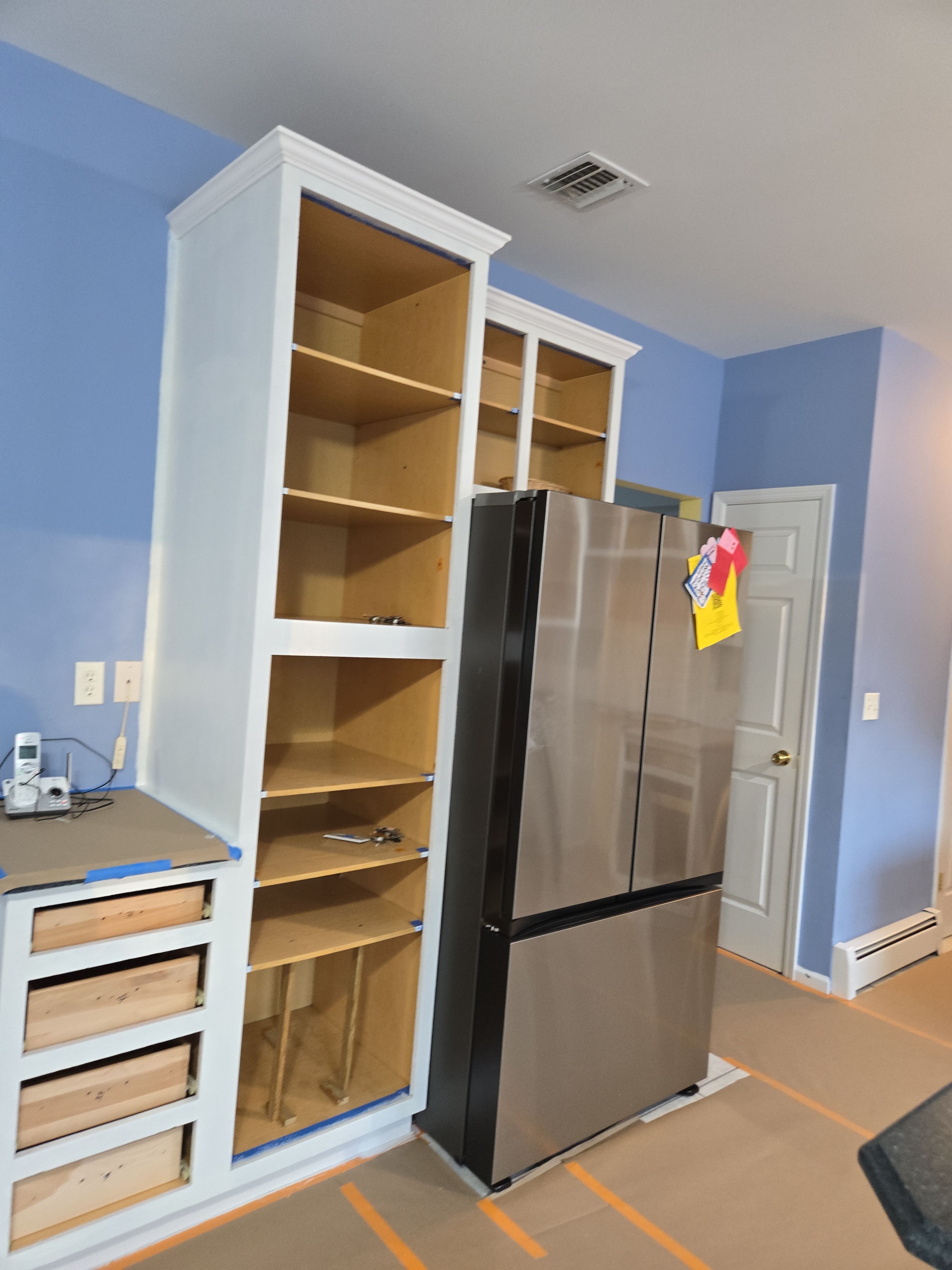 Cabinet Refinishing using Benjamin Moore Command by Spectrum Painting, LLC