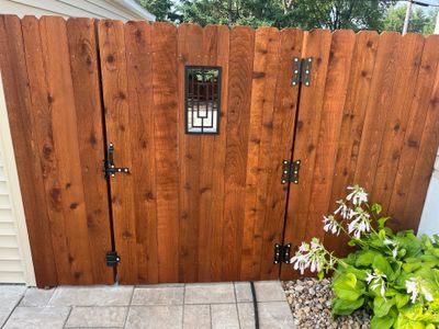 Custom Chestnut Stained Cedar Privacy Fence in Waterloo