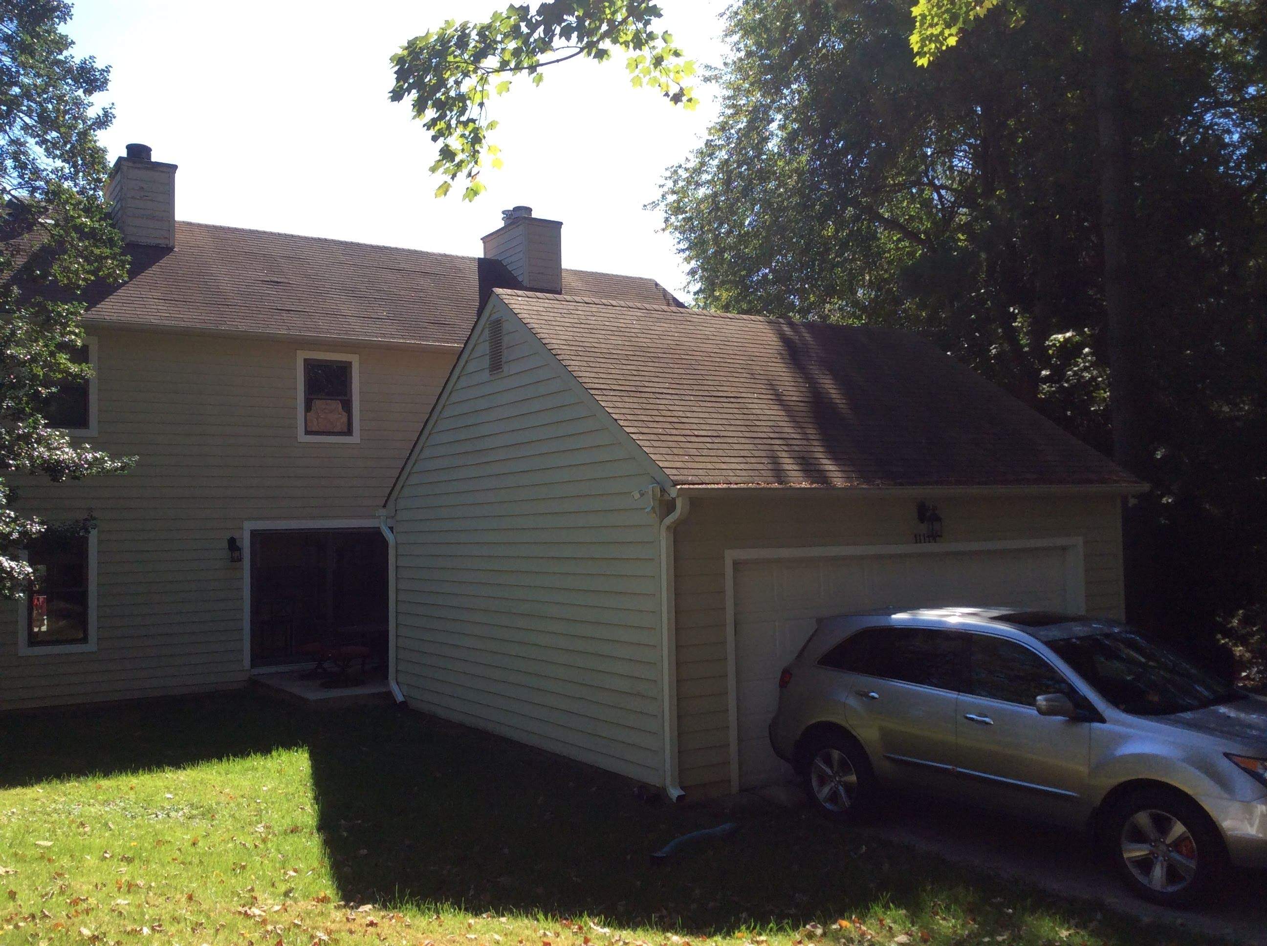 Residential Roofing Installation using Pewterwood Shingles  by Alpha Design Services