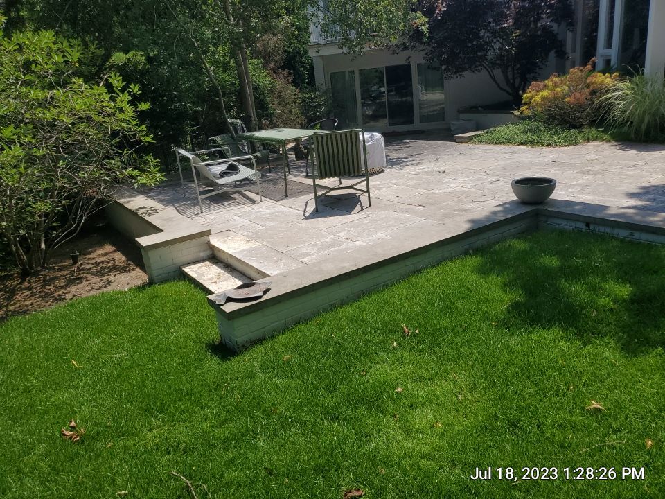 marble patio cleaning and sanding using Polysweep polymeric sand by Northern Power Washing LLC.