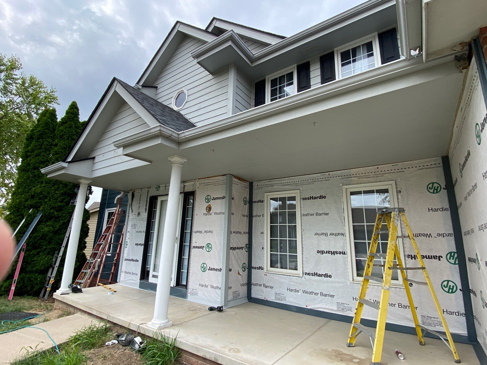 James Hardie Siding Transformation in Omaha with Evening Blue by Carps Complete Exteriors 