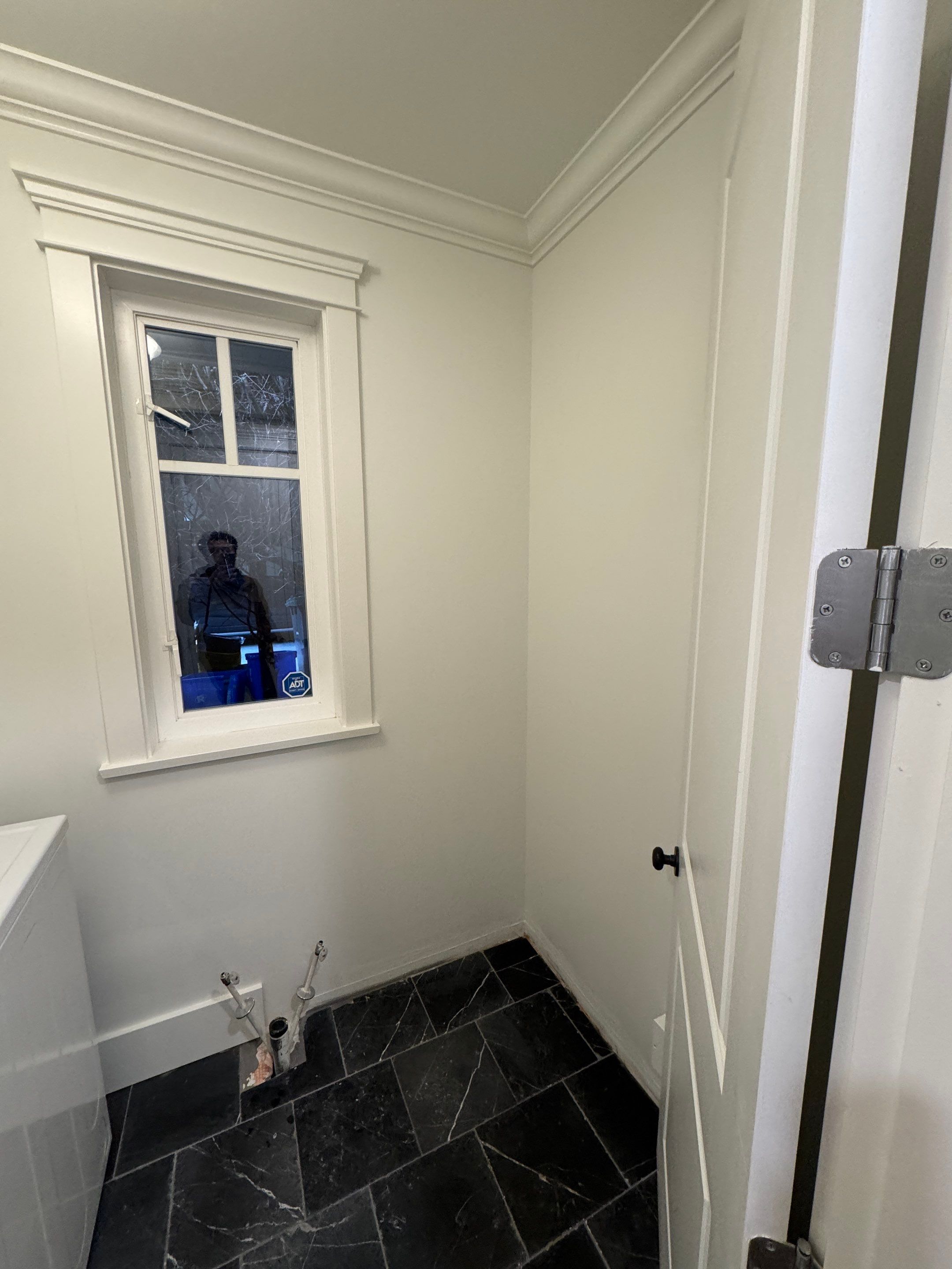 High-End Laundry Room Renovation and Restoration in Vancouver by YVR Construction Group
