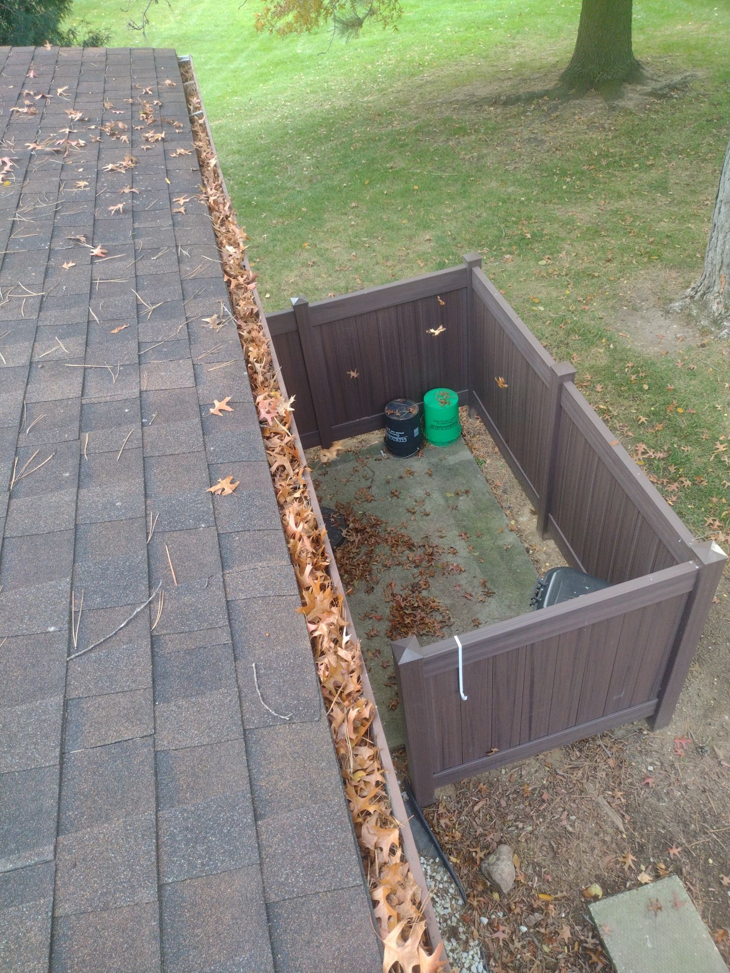 Commercial gutter cleaning Battle Creek, MI before photo with filled gutters