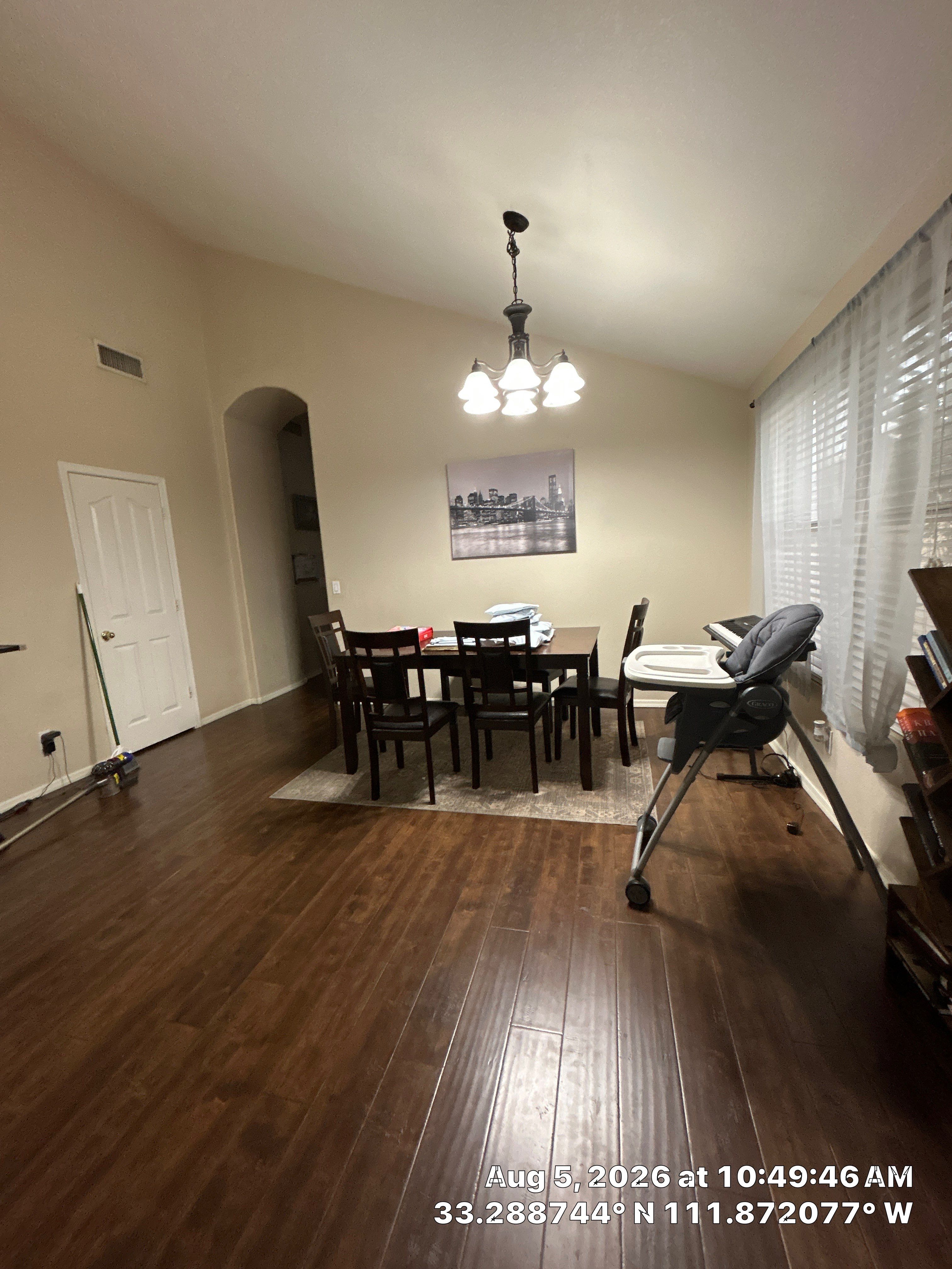 Chandler Dining Room Renovation Featuring New Lighting and Wood-Look Flooring by CompanyCam Sales Demo