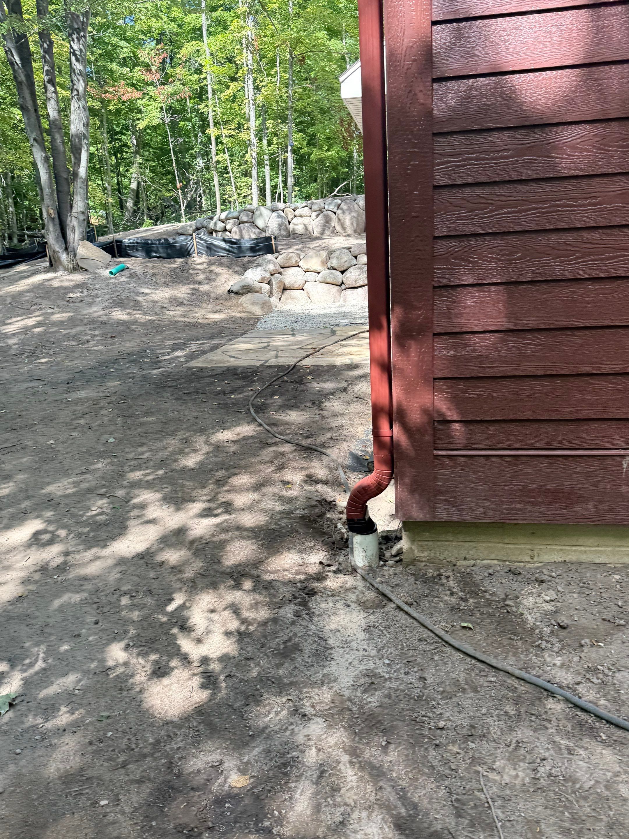 Gutter and Gutter Helmet Installation for Charlevoix Residential Project by Rainbow Seamless Systems