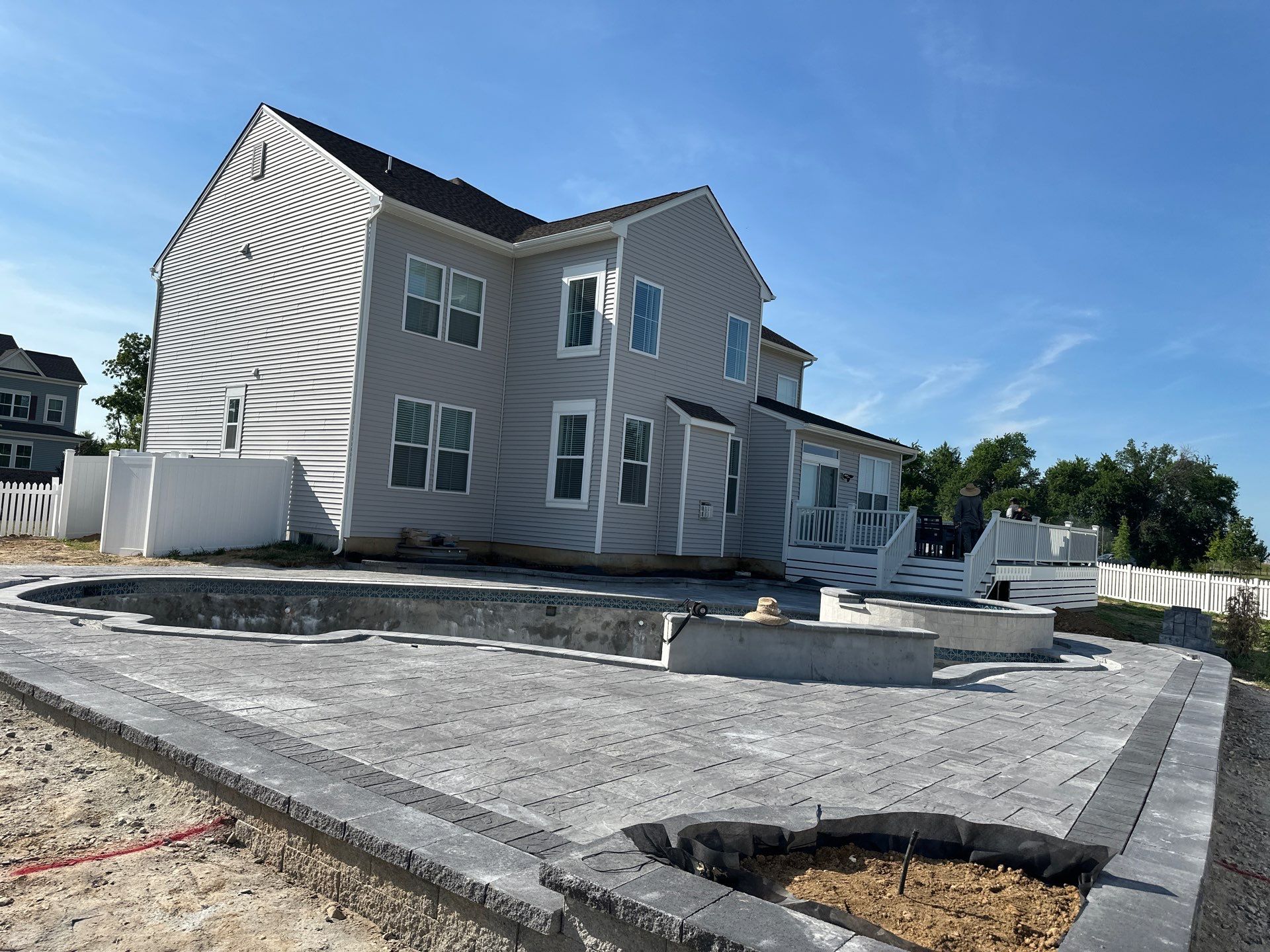 Pool and Hardscape Design in Delaware | Belgard Paver Patio & Outdoor Living Space by Studio G Indoor Spaces & Outdoor Living