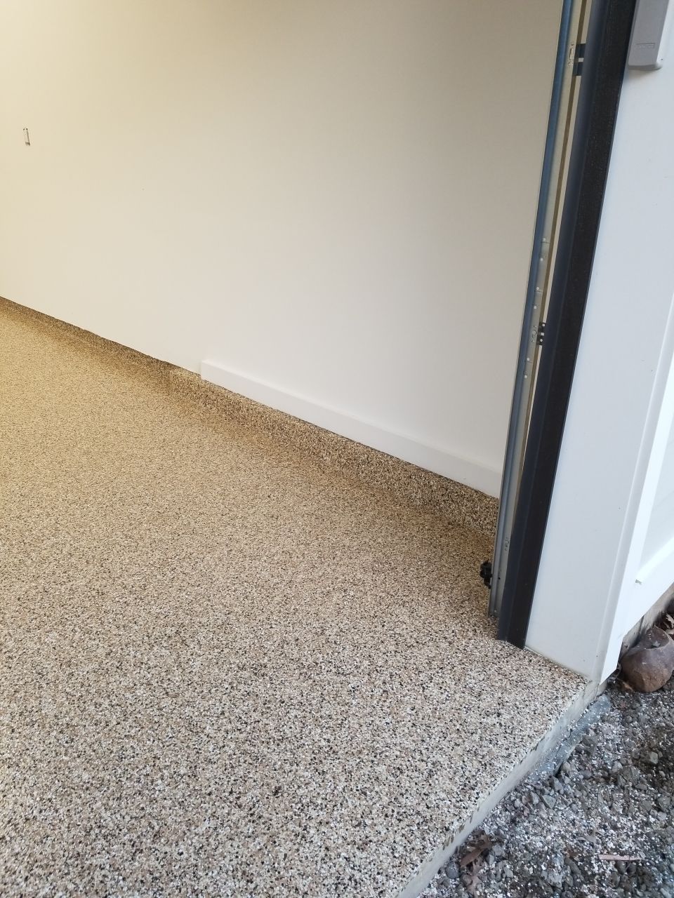 Garage Floor in Sandstone by Spectrum Painting, LLC