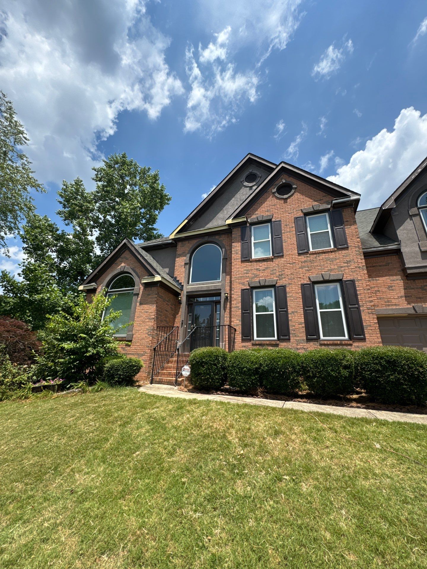 Full Exterior Painting and Gutter Replacement for Powder Springs Home by Swift Home Renovations