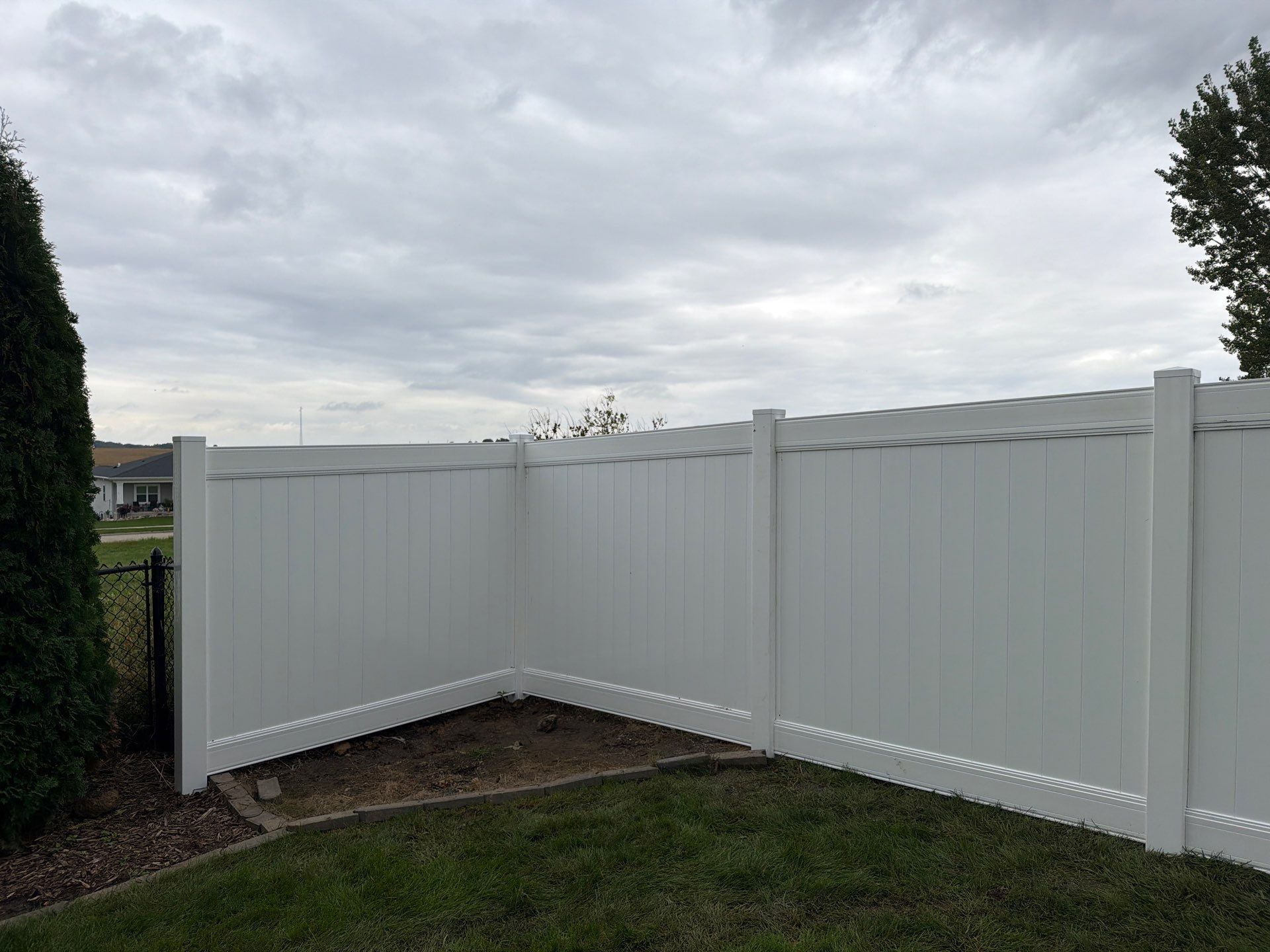 Residential Vinyl Privacy Fence Installation in Urbana by Perfect Picket Fence and Stain