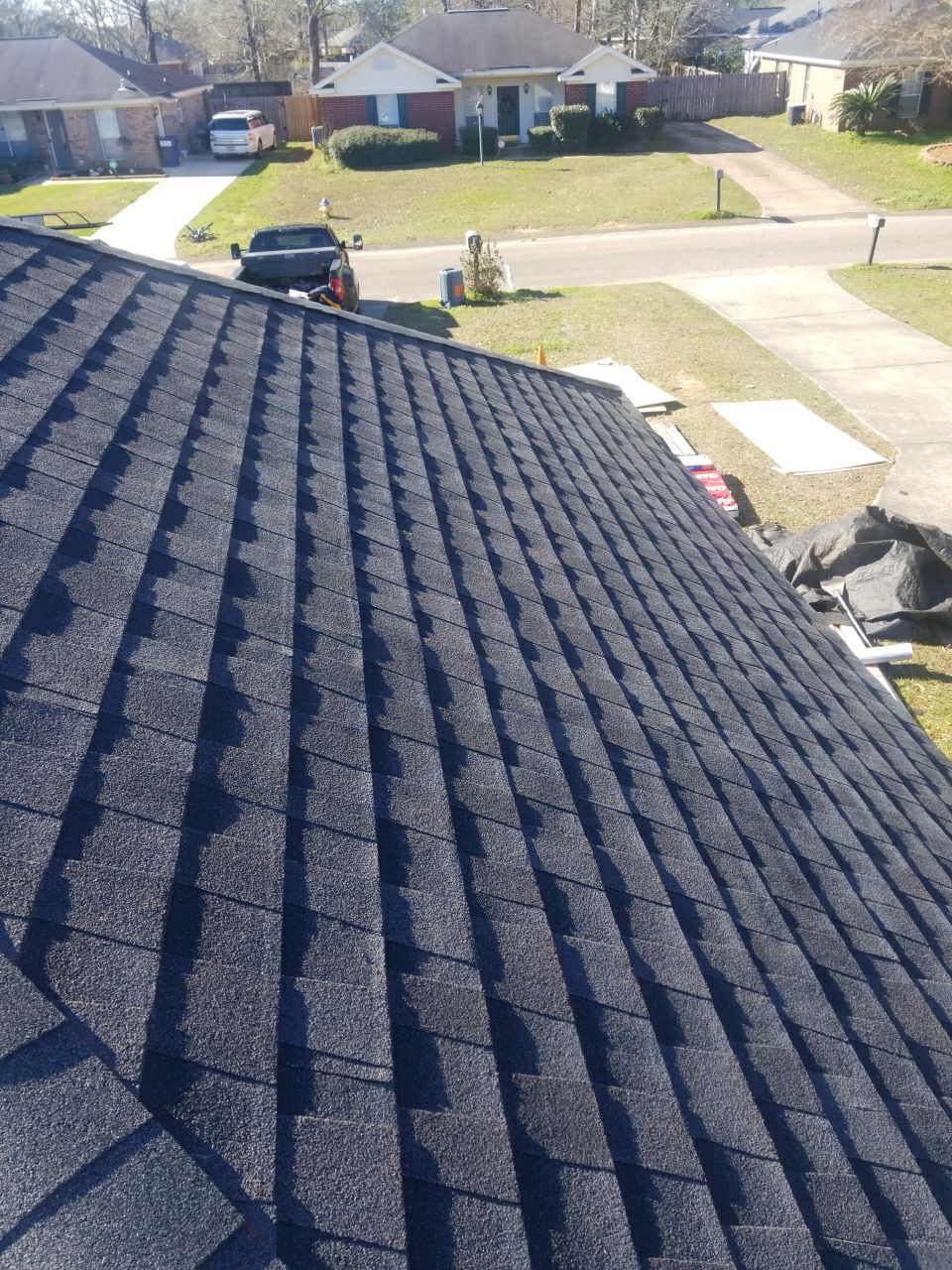 Residential Roofing Installation using Roof Replacement by American Roofing & Construction LLC