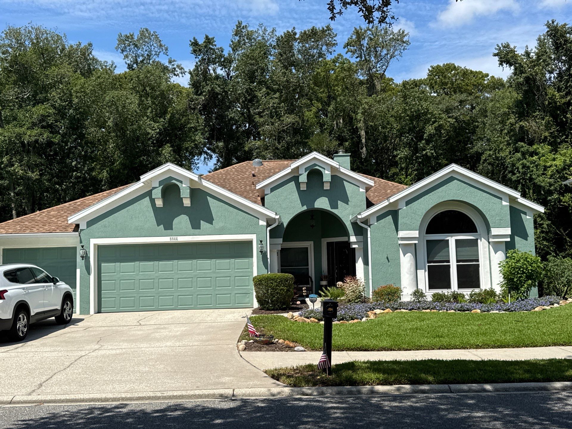 Stucco Exterior Repainting with White Soffits & Fascia | Hampton Park, Jacksonville, FL