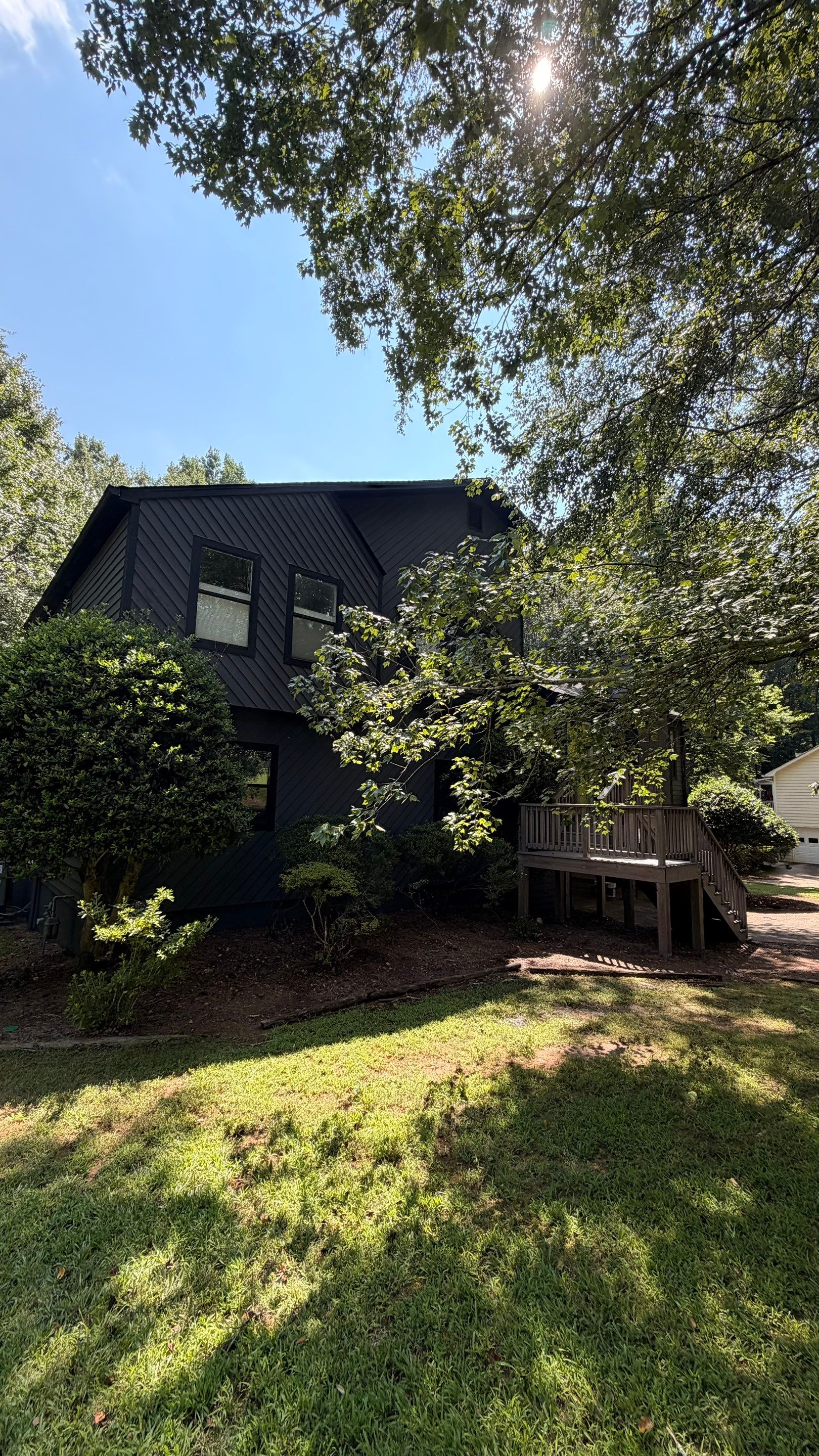 Dark Grey Exterior Painting and Front Door Refresh in Marietta by Swift Home Renovations