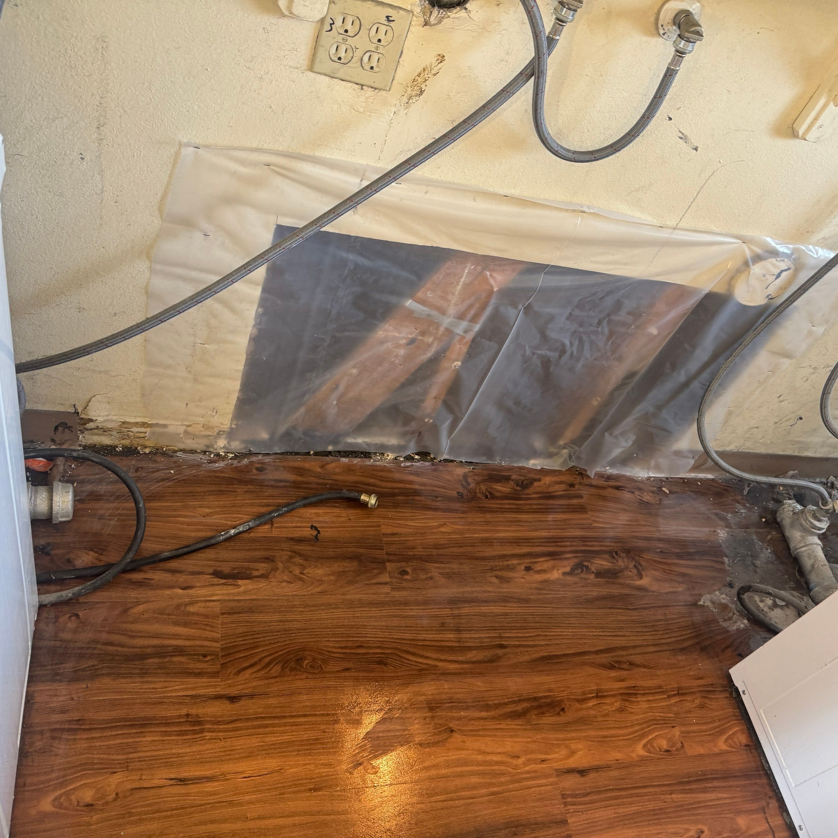 Laundry Room Water Restoration & Rebuild in Irvine by One Stop Source