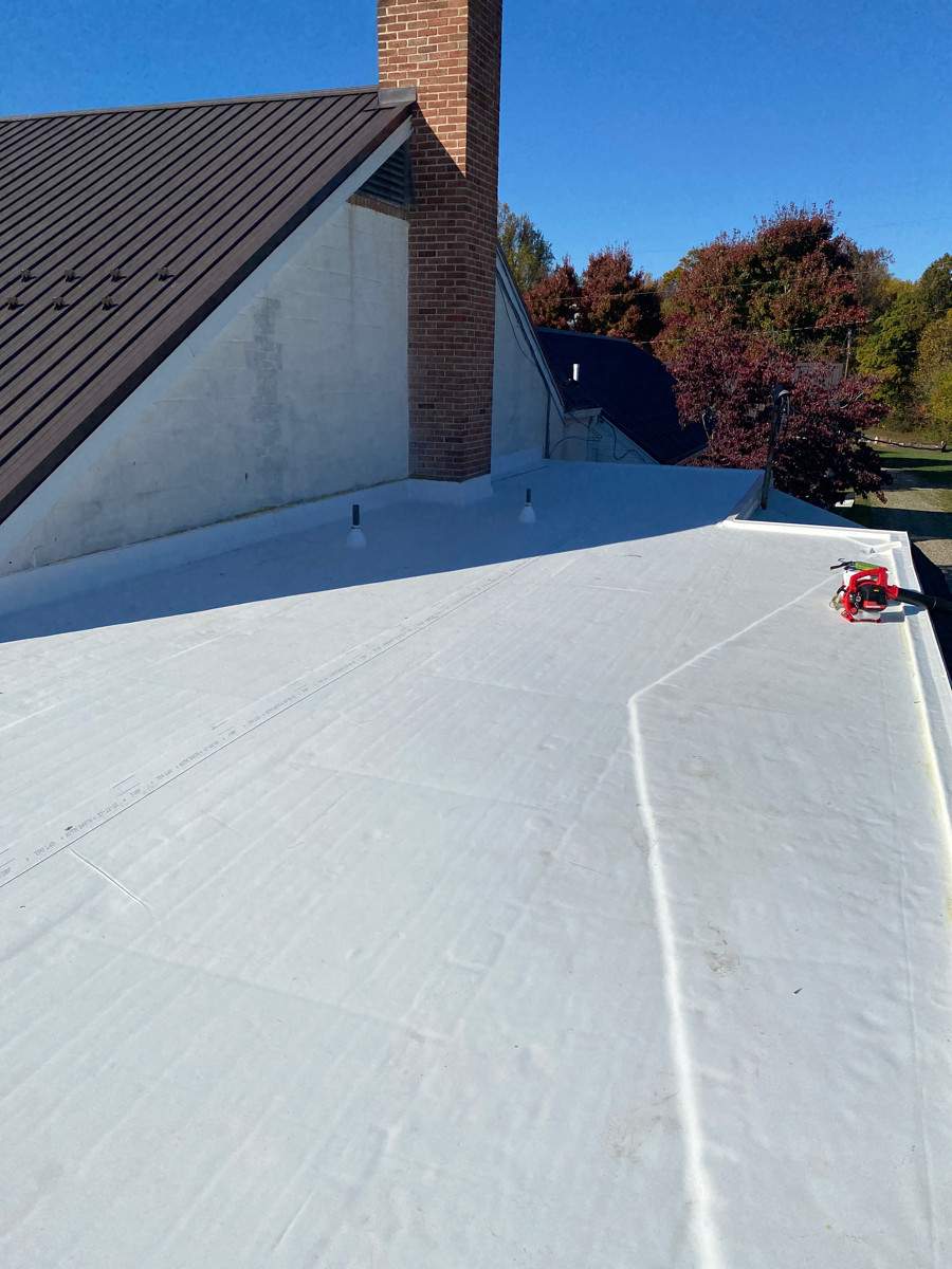 Roof Installation using Silicone TPO by ExteriorPros
