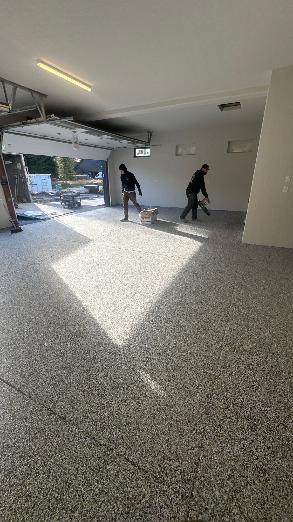 Garage Transformation using Domino by Croc Coatings, LLC