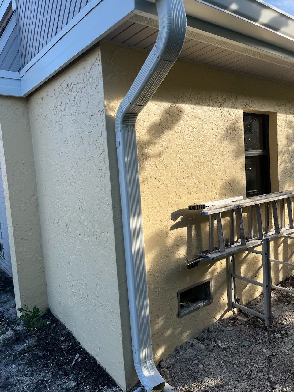 K-Style Seamless Gutter Installation using White Seamless Gutters in Sanibel FL by Gutter Professors