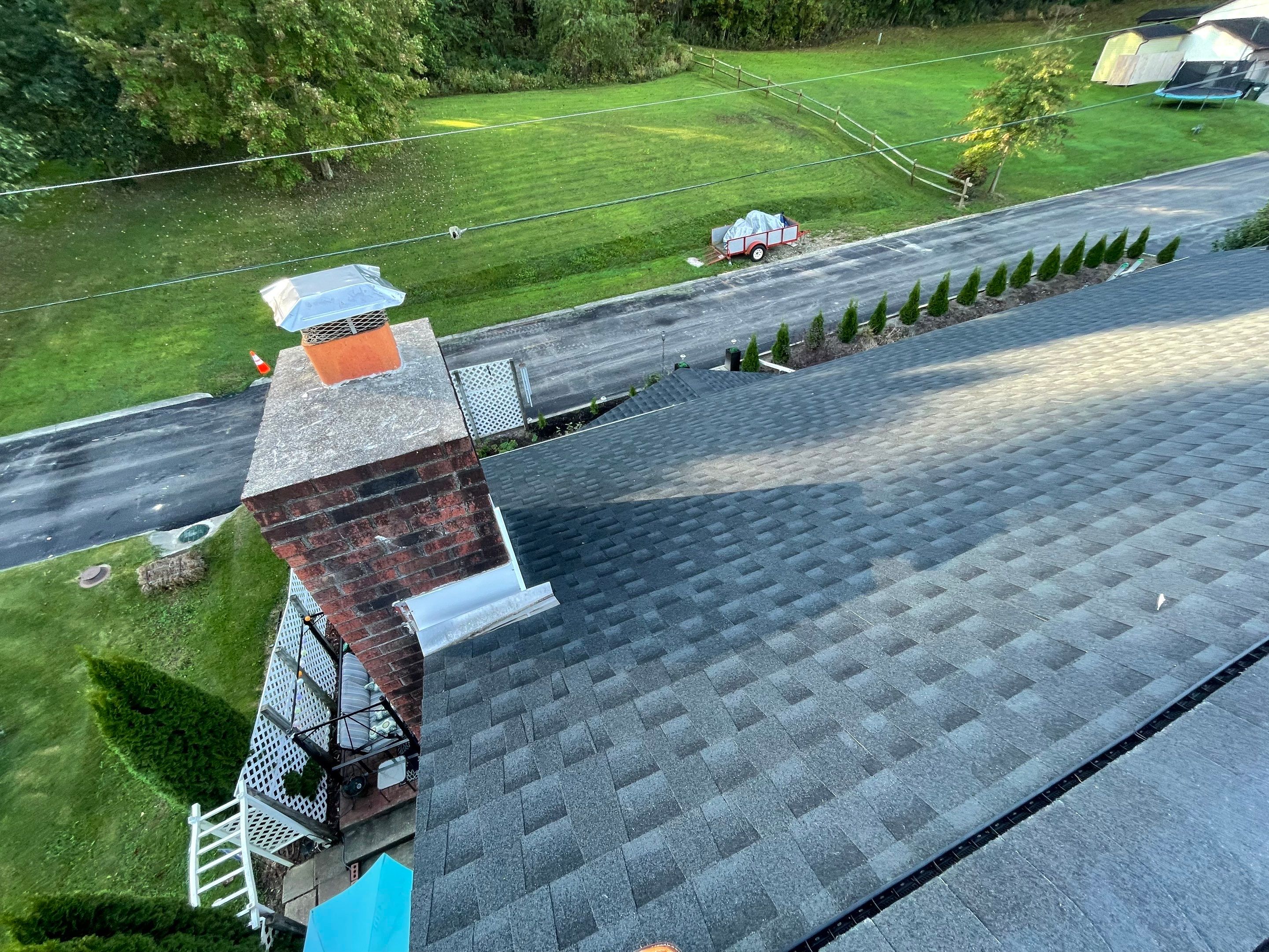 Residential Roofing Installation using GAF Timberline HDZ, Black by Rainstoppers Roofing