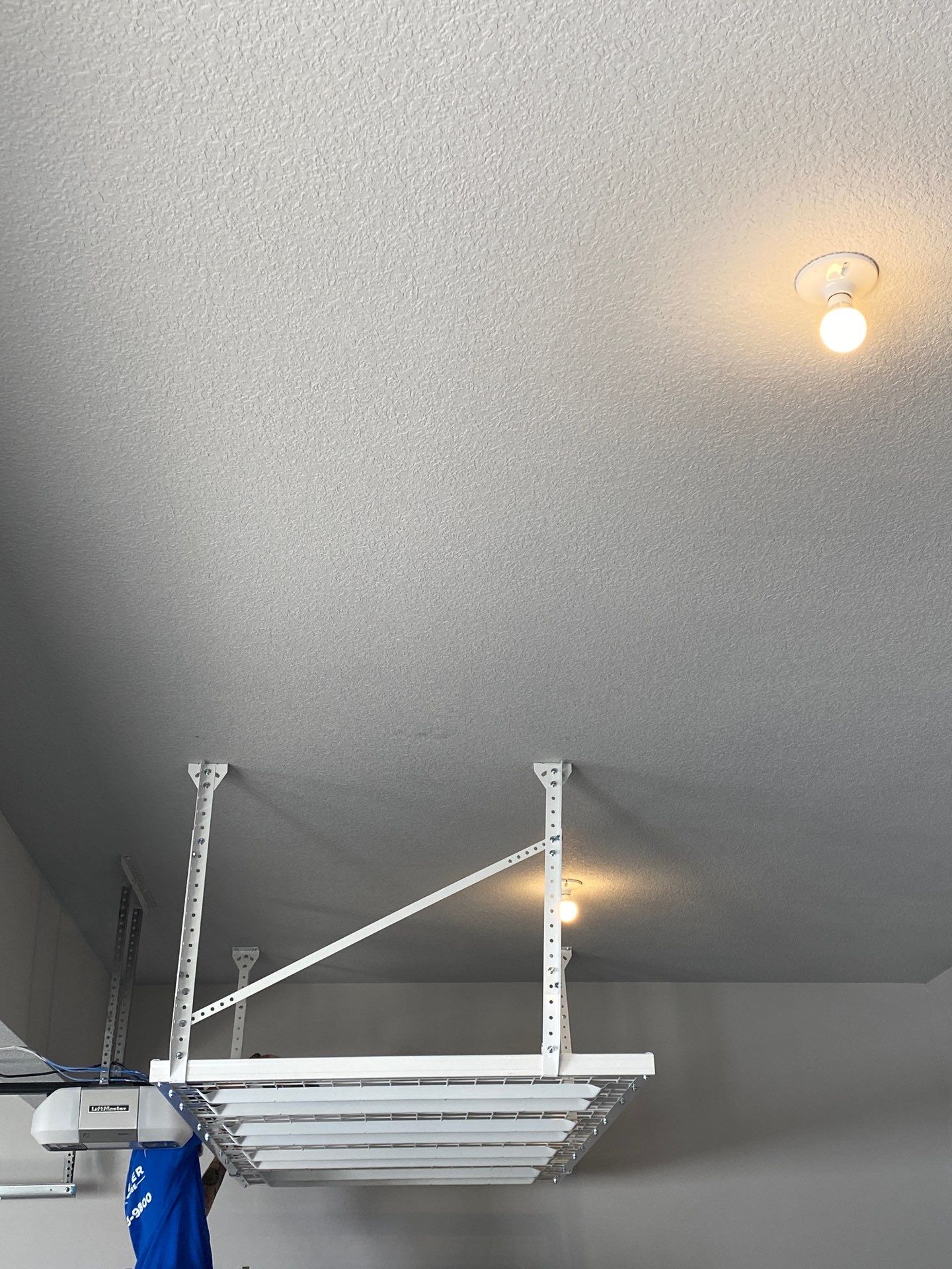 Karen A. adds ceiling rack to garage! by Banner Garage