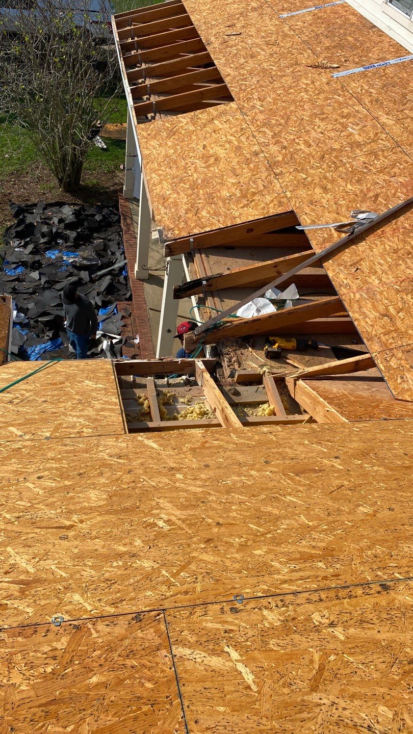 Residential Roofing Installation using Roof Replacement by American Roofing & Construction LLC