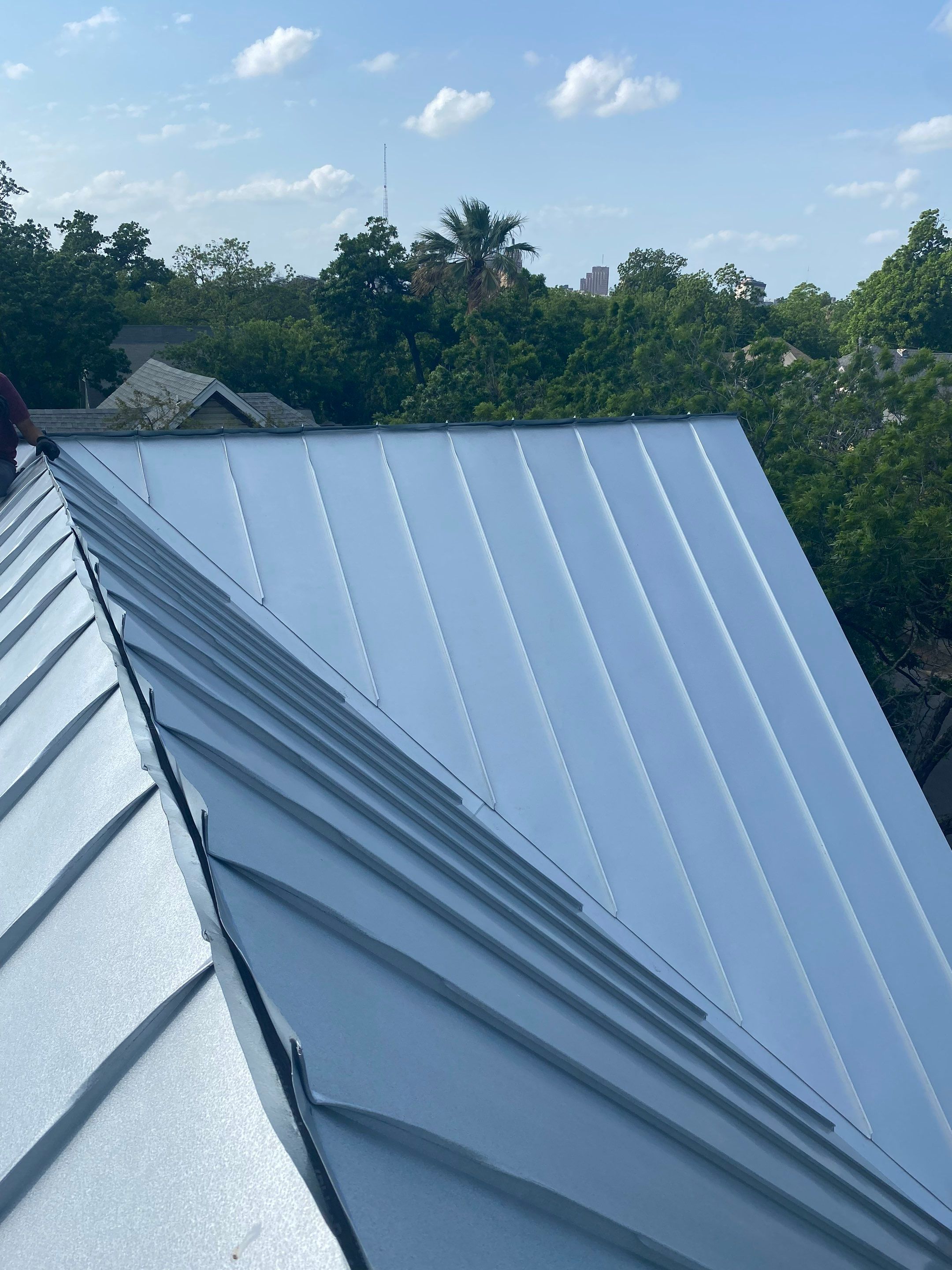 Residential Metal Roof Installation using McElroy Metal by Premier Roofing and Contracting
