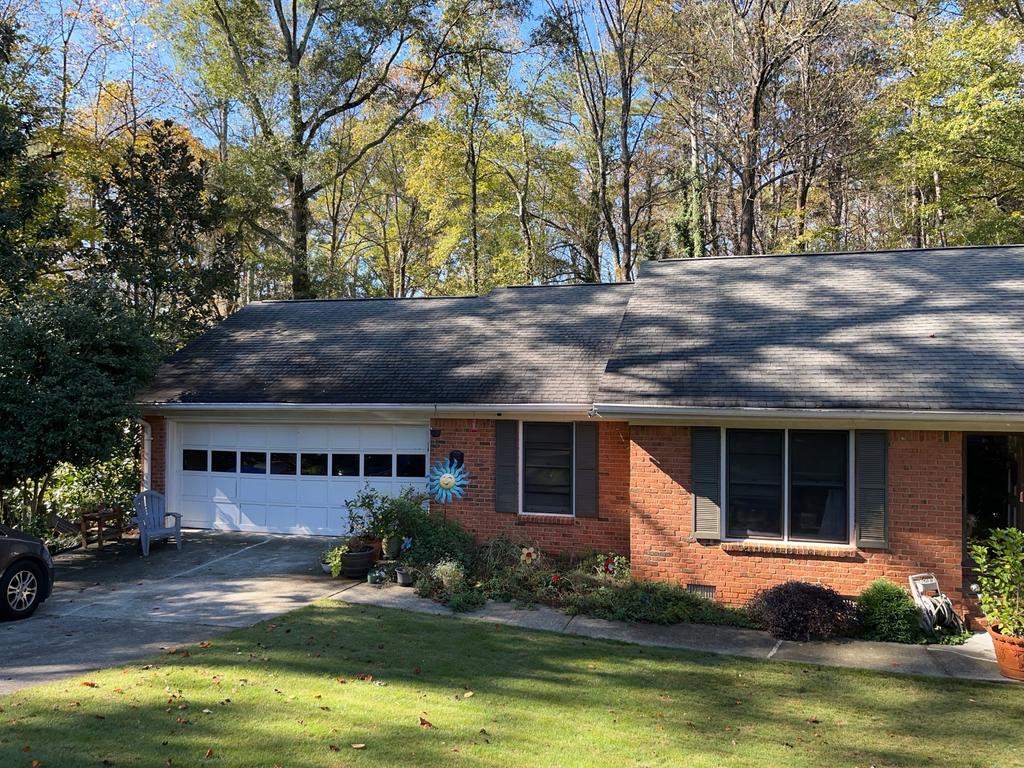 Gable Siding and Rotten Wood Replacements in Atlanta, GA with New Door and Window Installs by Nelson Exteriors 