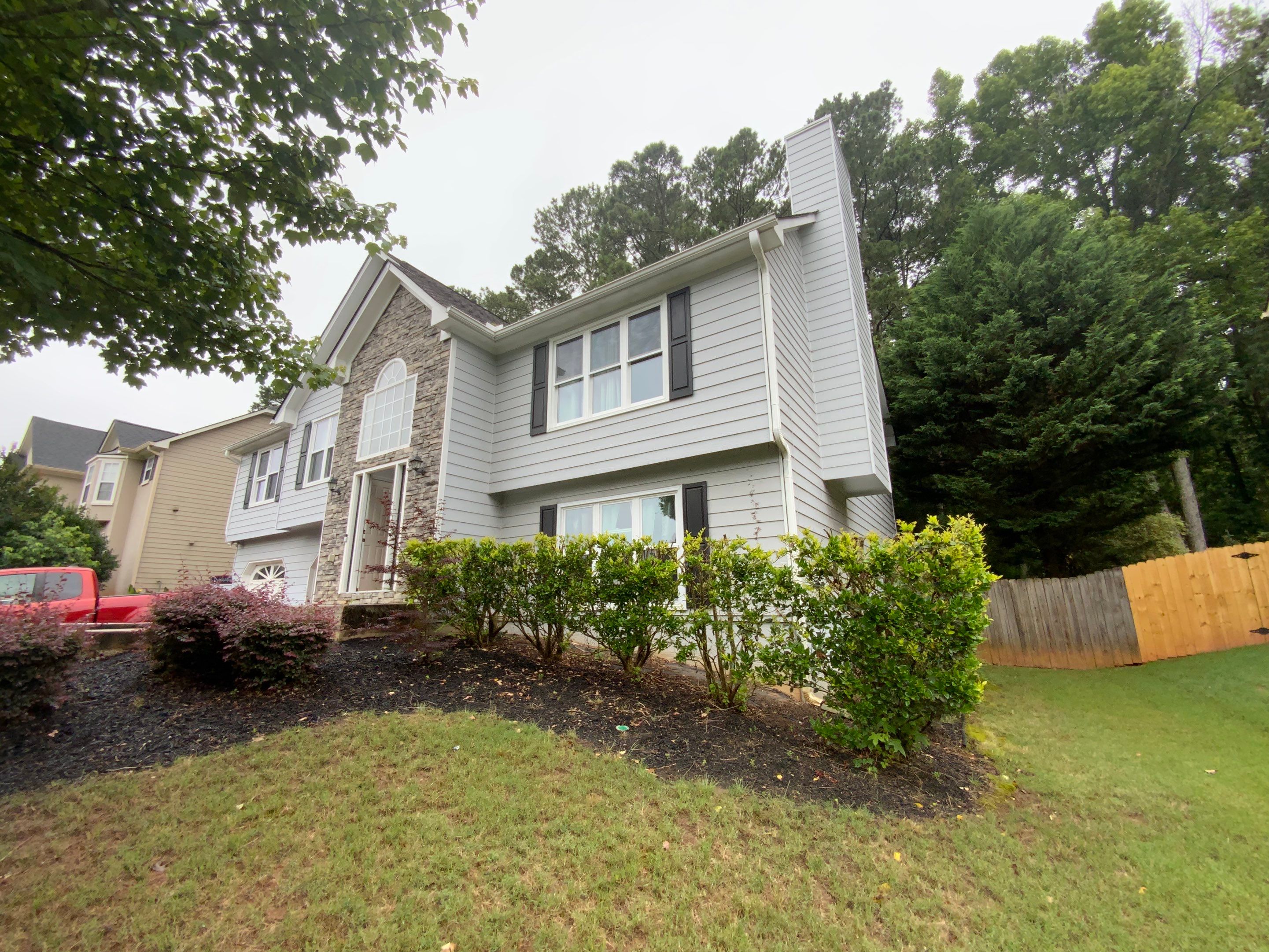 Gutter Replacement for a Two-Story Home in Woodstock by Swift Home Renovations