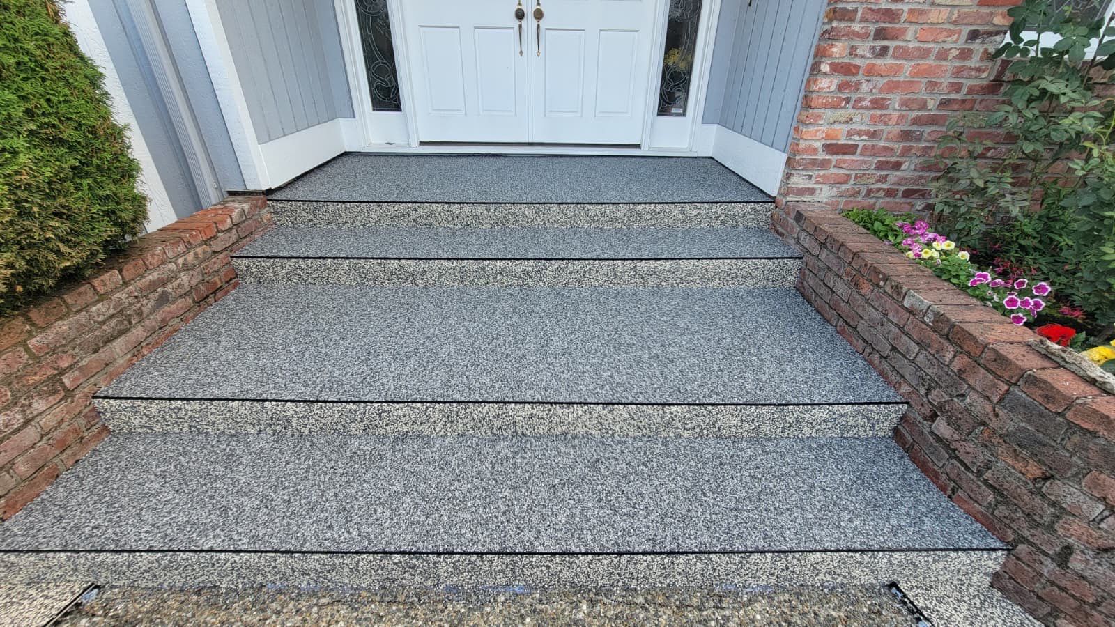 Elegant Driveway and Patio in Palazzo Vuba Stone by Concrete Coating Experts Inc.