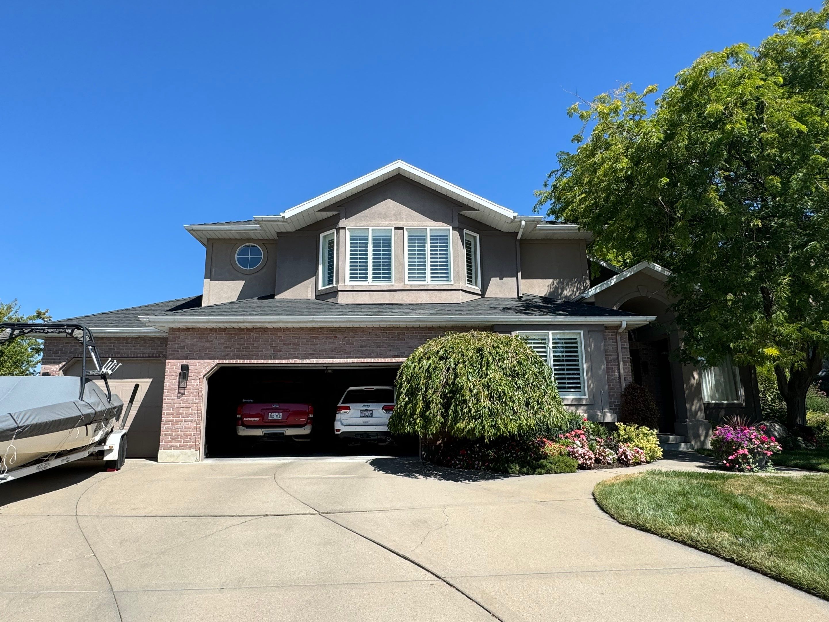 Centerville | High-End Stucco Conversion Accent | Walnut Cedar & Primed B&B by Ideal Siding Utah